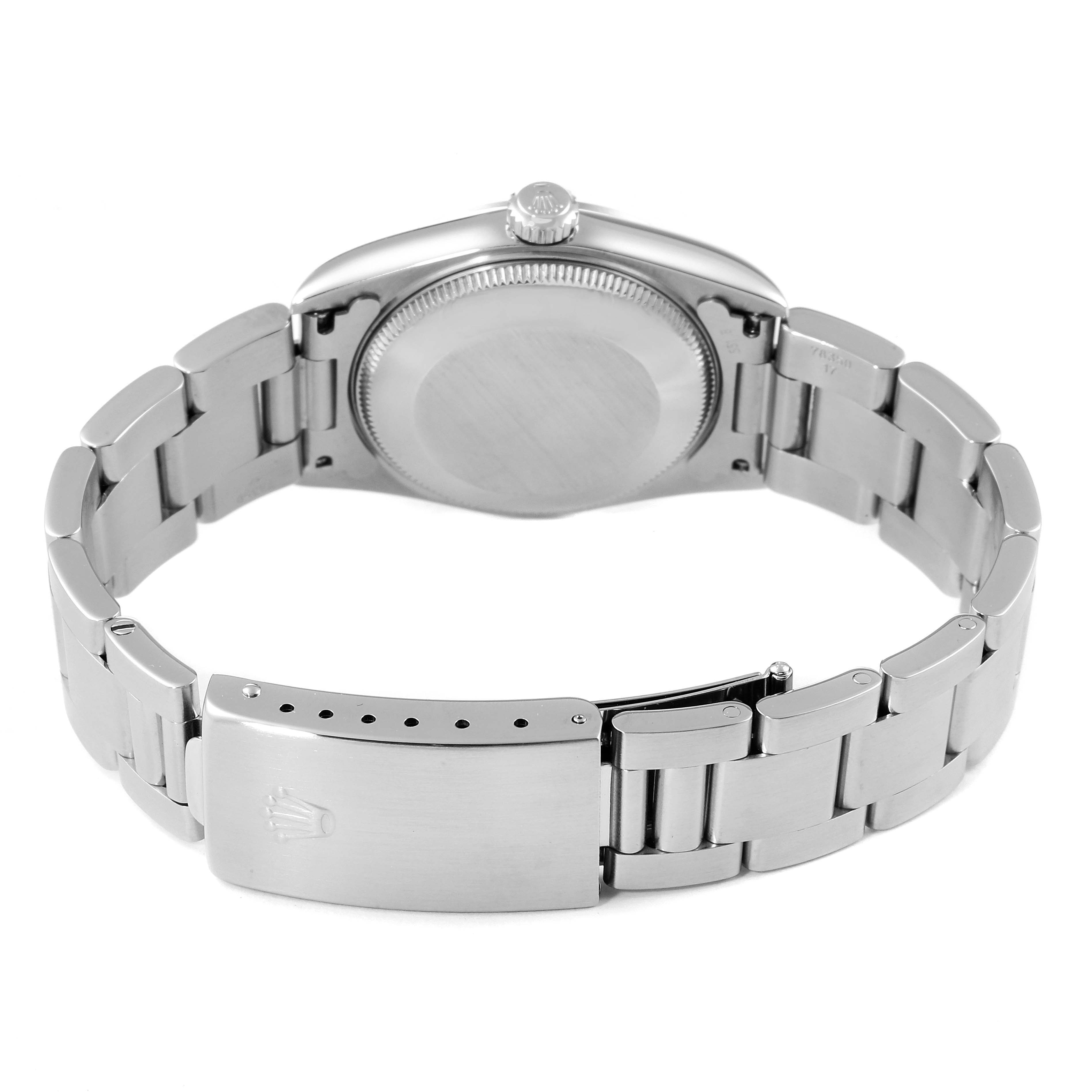 This image shows the back case and bracelet clasp of a Rolex Mid-Size 77080 Women
s Stainless Steel Black Dial 77080 Women
s Stainless Steel Black Dial model watch from a back angle.