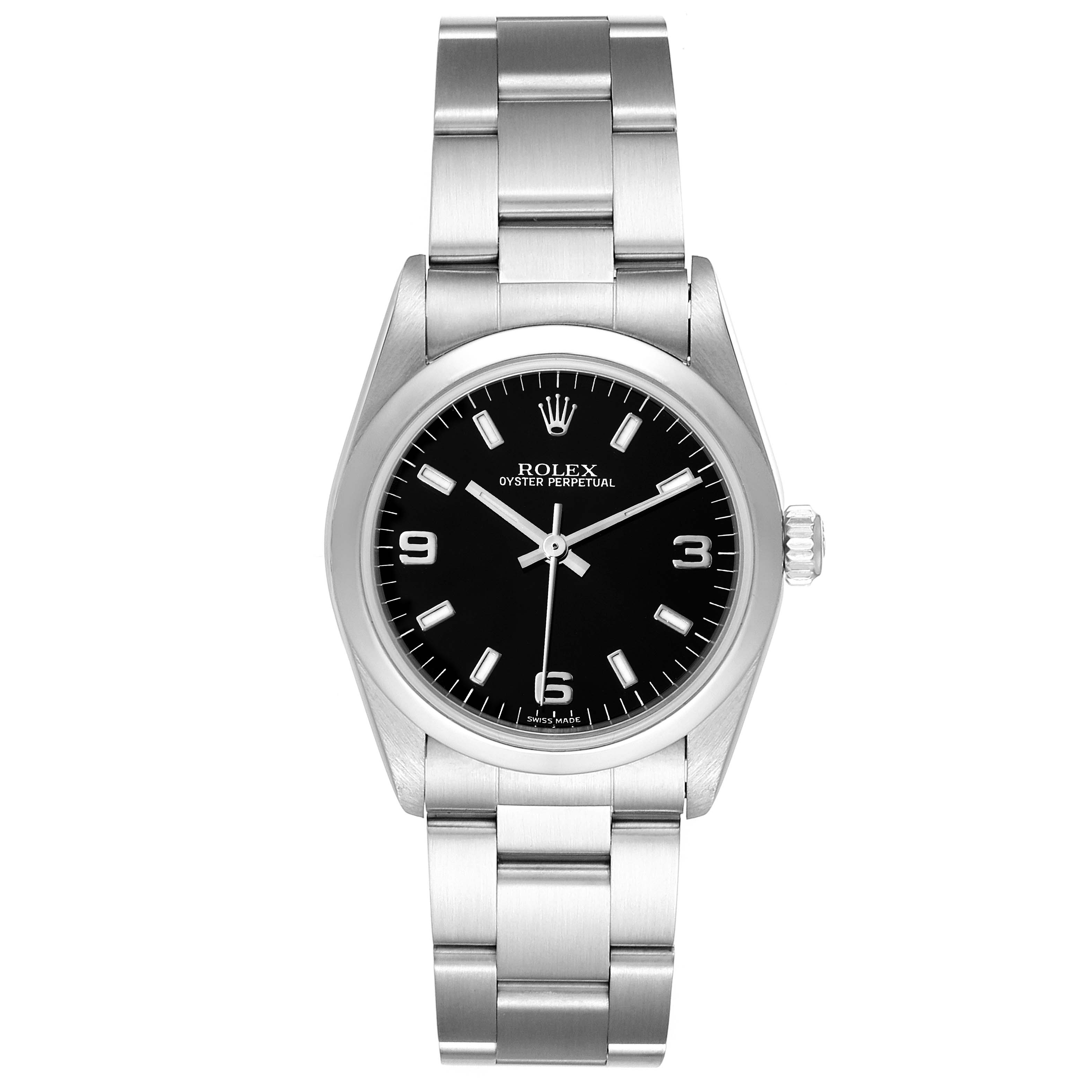 The image shows a front view of a Rolex Oyster Perpetual Mid-Size watch, showcasing the black dial, silver markers, and stainless steel bracelet.