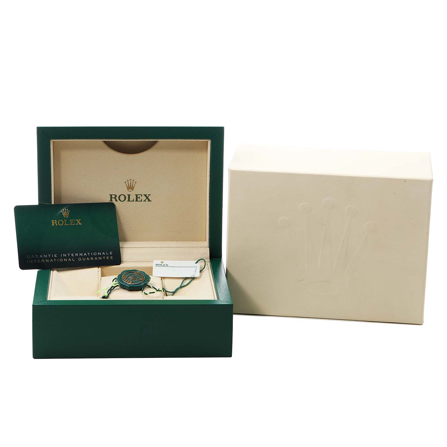 The image shows the open box of a Rolex Oyster Perpetual 126000 Men's Stainless Steel Pink Dial with its guarantee card, tag, and outer box.