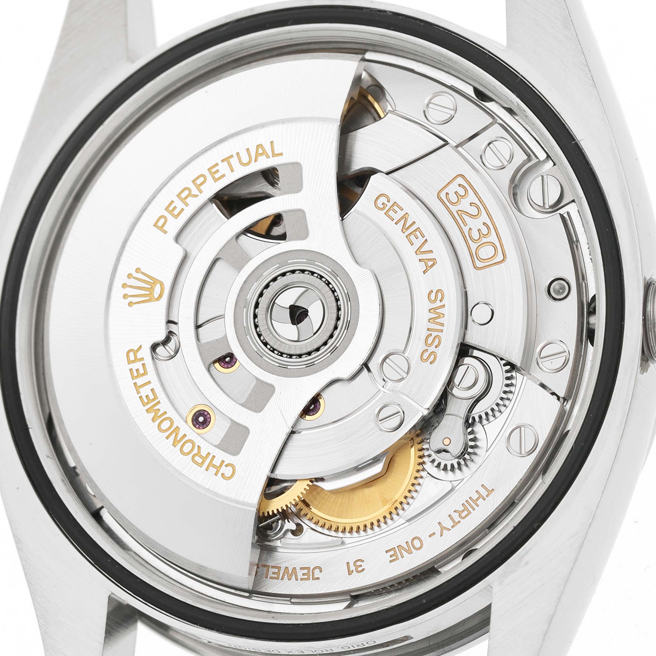 The image shows the detailed movement of a Rolex Oyster Perpetual 126000 Men's Stainless Steel Silver Dial watch from the back, highlighting the rotor and gears.