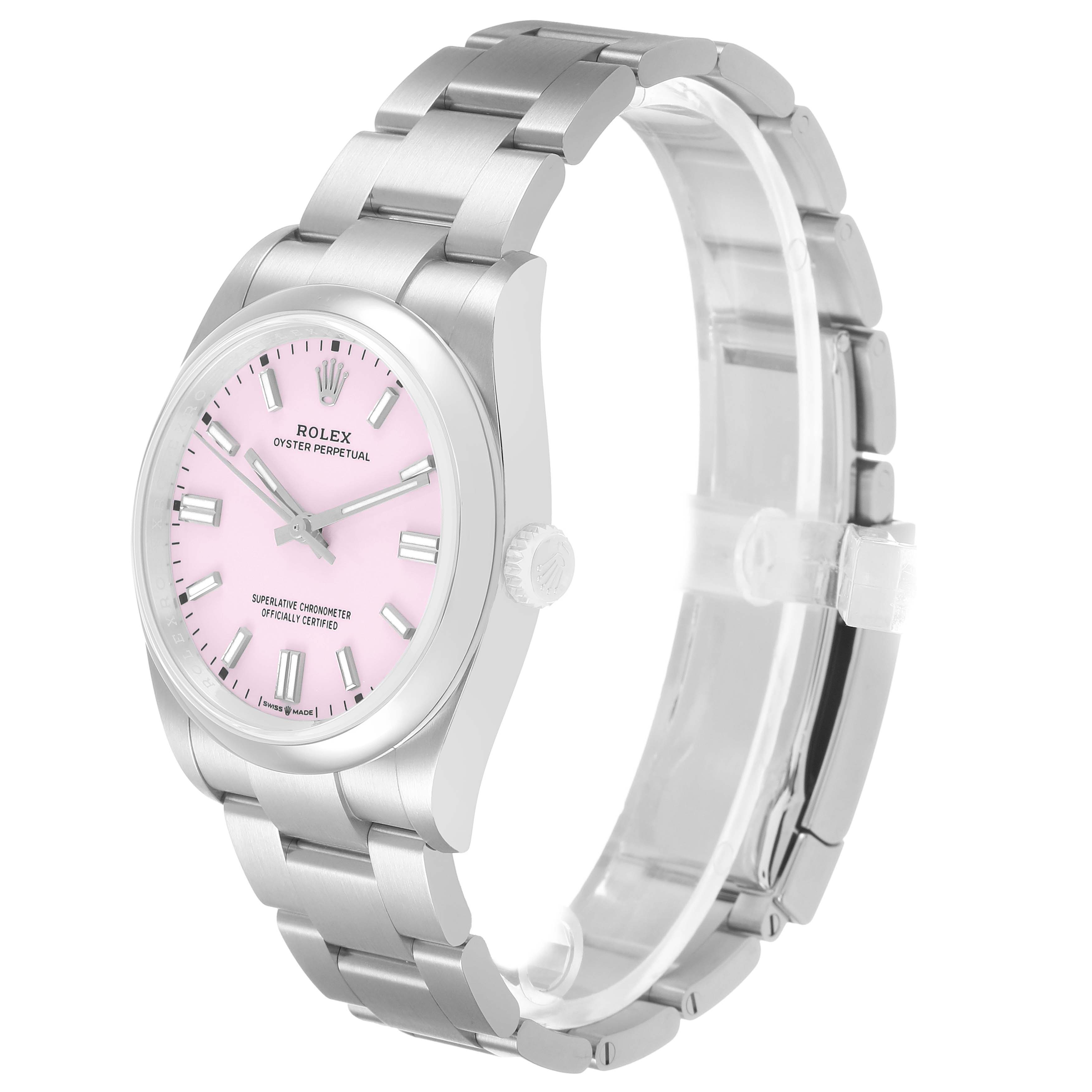 The Rolex Oyster Perpetual 126000 Men's Stainless Steel Pink Dial watch is shown at an angled side view, highlighting the bracelet, case, and pink dial.