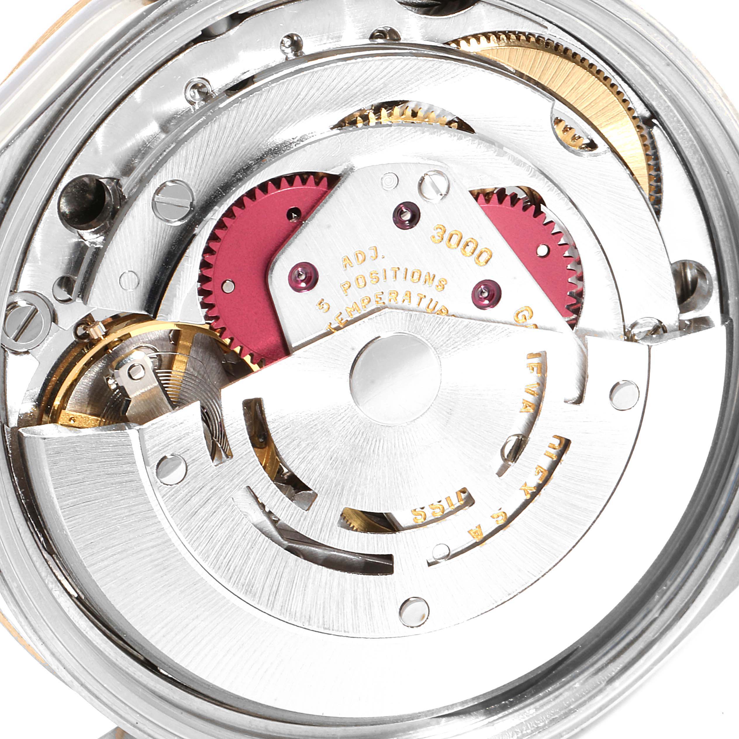 This image shows the internal mechanical movement of a Rolex Oyster Perpetual 14203 Men's Steel and Gold (two tone) Grey Dial 14203 Men's Steel and Gold (two tone) Grey Dial watch.
