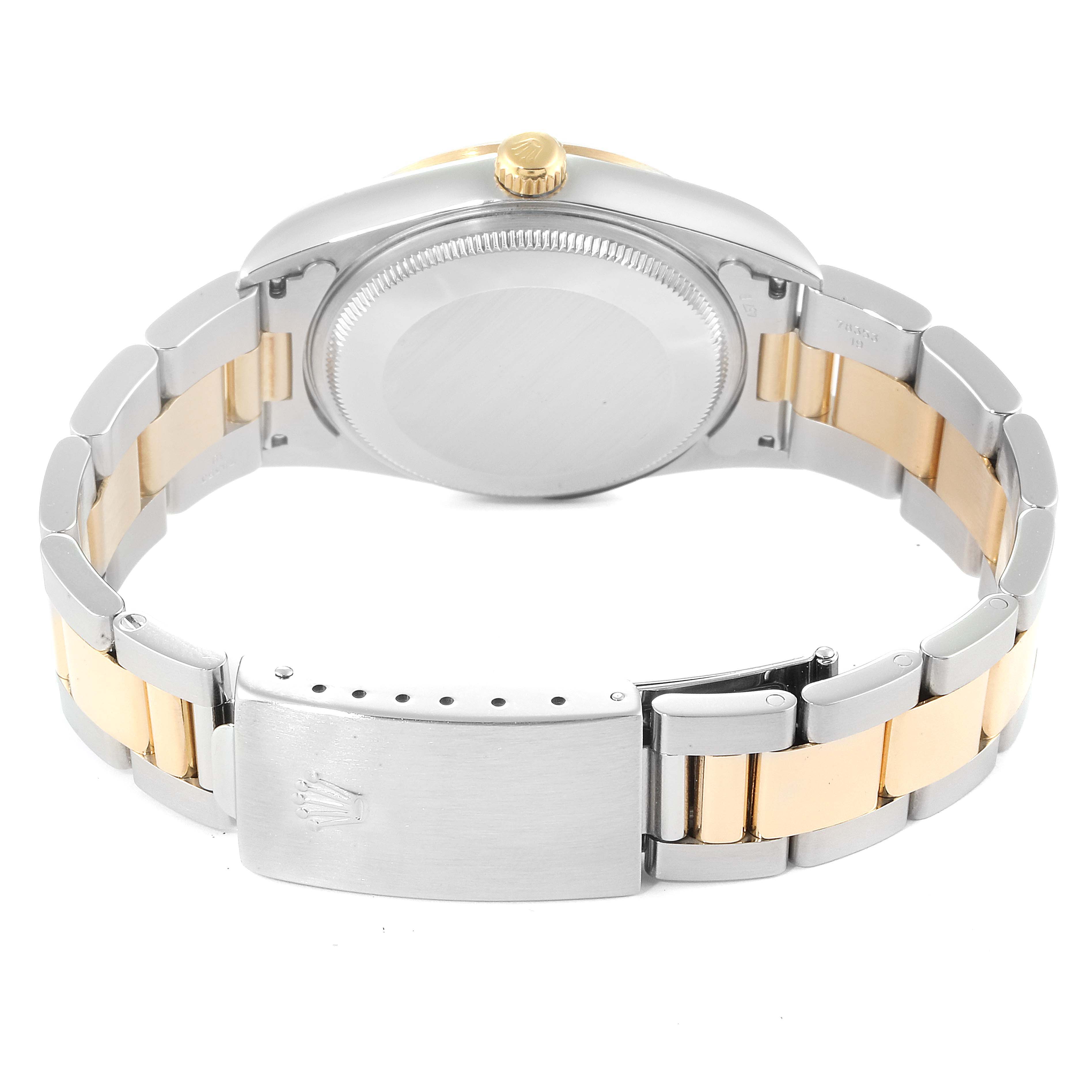 The image shows the back and side view of a Rolex Oyster Perpetual 14203 Men's Steel and Gold (two tone) Grey Dial 14203 Men's Steel and Gold (two tone) Grey Dial's case, bracelet, crown, and clasp.