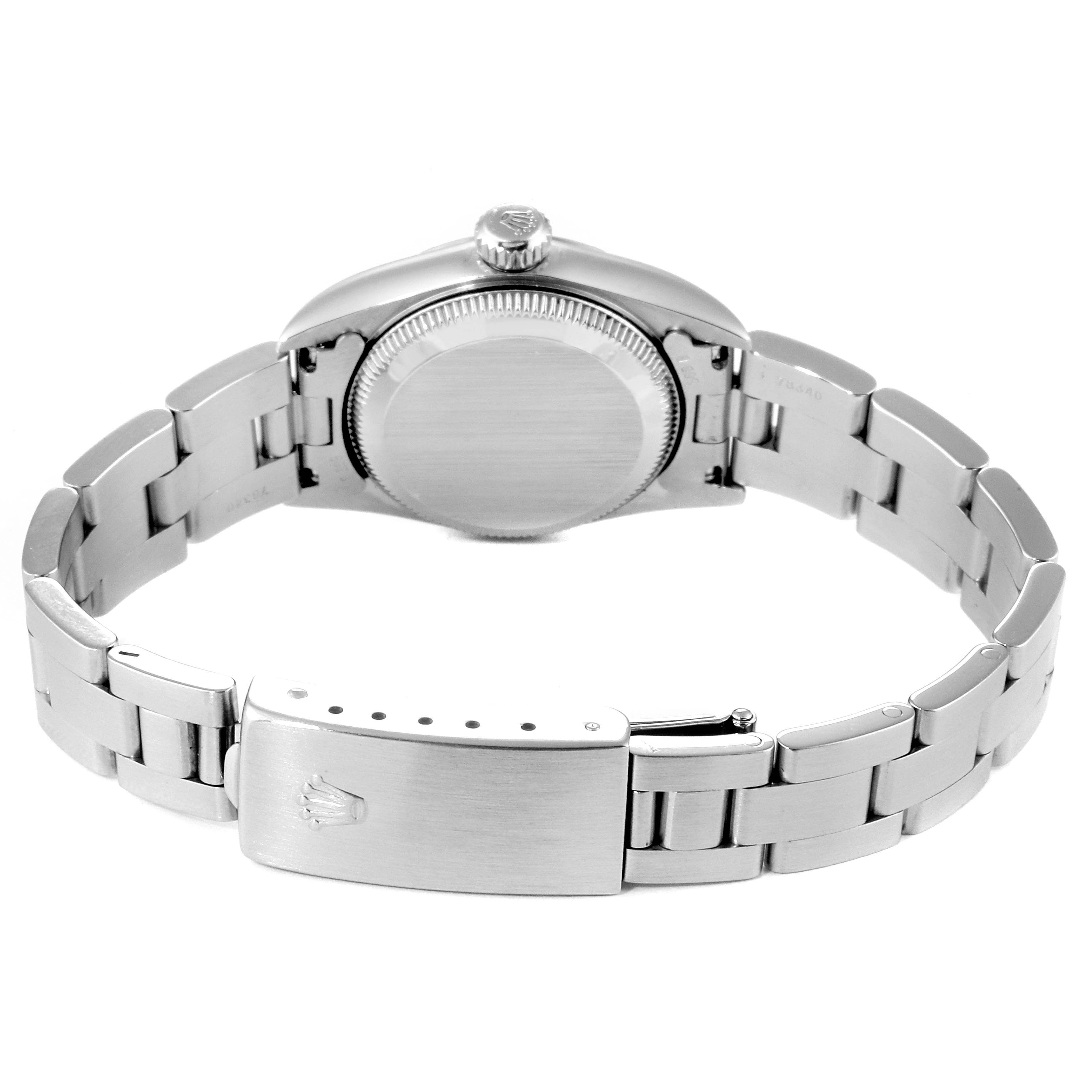 The image shows the back view of a Rolex Oyster Perpetual 67230 Women's Stainless Steel Pink Dial 67230 Women's Stainless Steel Pink Dial watch, displaying the bracelet and clasp.