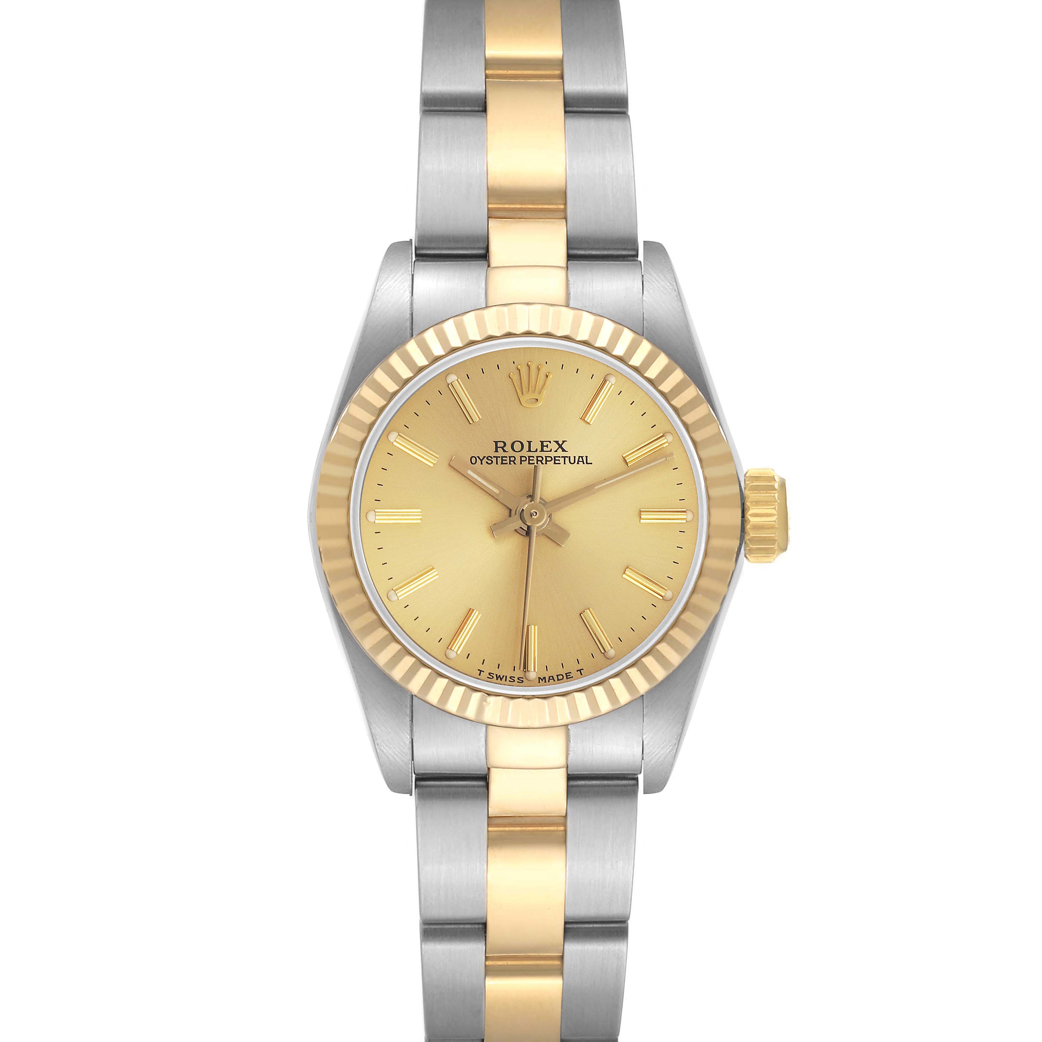 The Rolex Oyster Perpetual 67193 Women
s Steel and Gold (two tone) Champagne Dial 67193 Women
s Steel and Gold (two tone) Champagne Dial watch is shown from a top-down angle, highlighting the dial, bezel, crown, and two-tone bracelet.