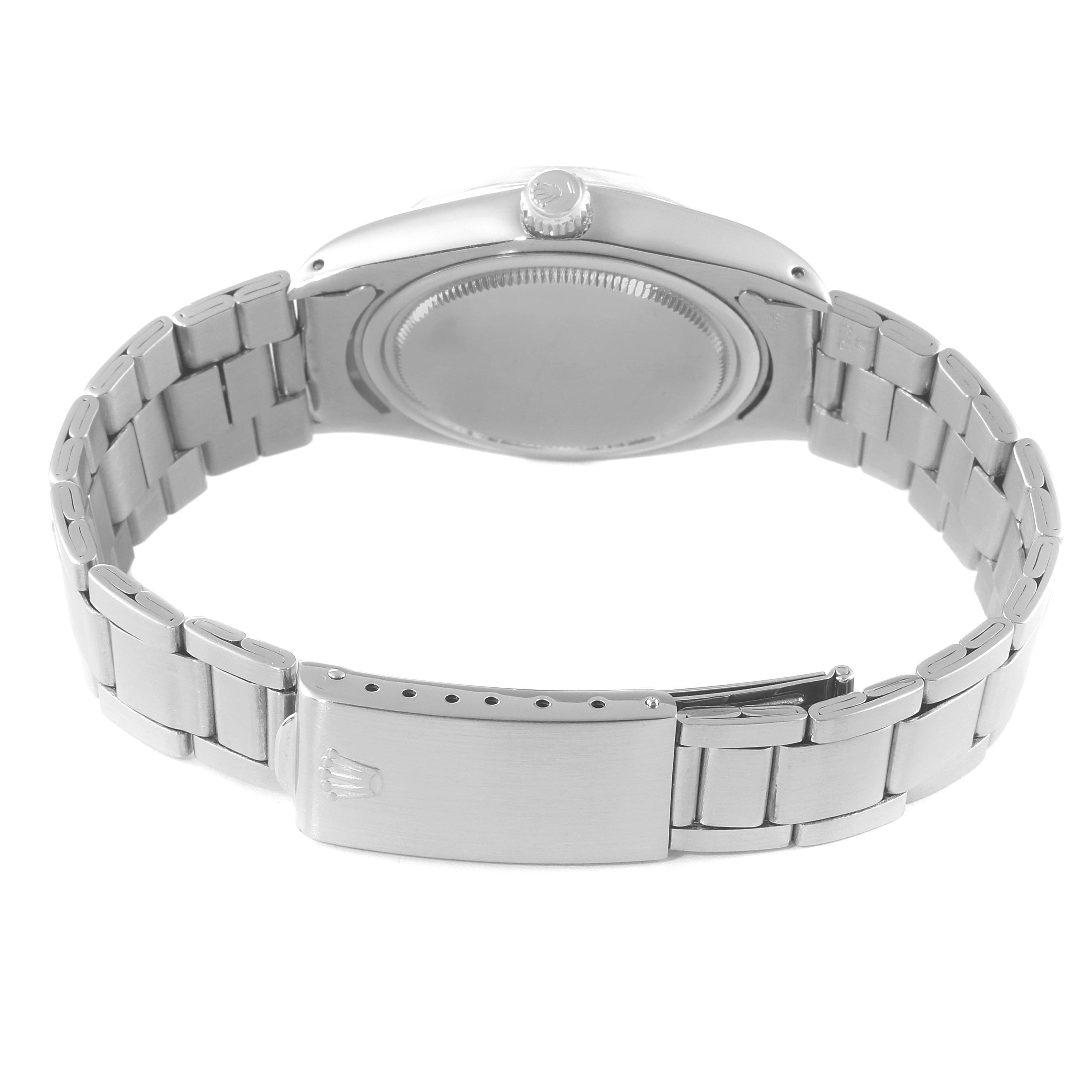 The image shows the back view of a Rolex Date 6694 Men's Stainless Steel Silver Dial 6694 Men's Stainless Steel Silver Dial model watch, focusing on the case back, bracelet, and clasp.