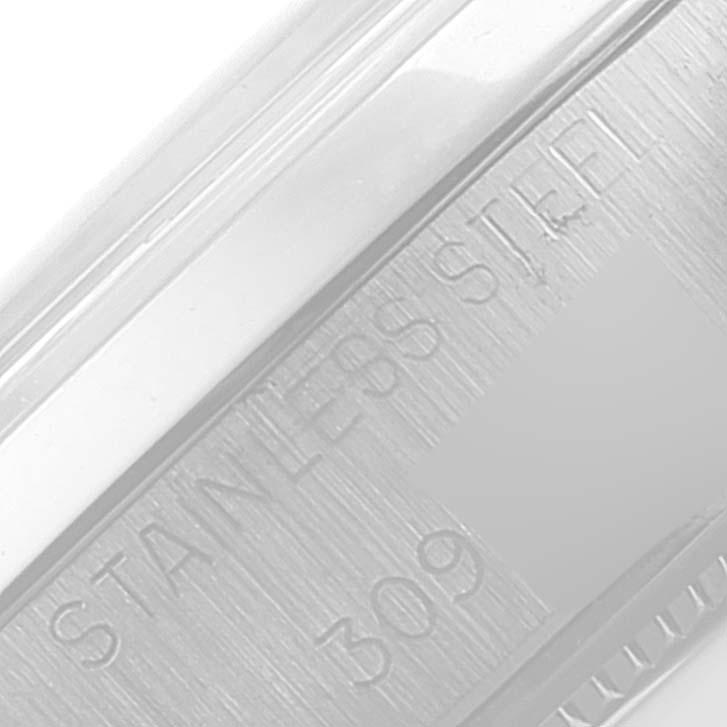 The image shows a close-up angle of the case side of a Rolex Date 6694 Men's Stainless Steel Silver Dial 6694 Men's Stainless Steel Silver Dial model, highlighting the "STAINLESS STEEL" engraving.