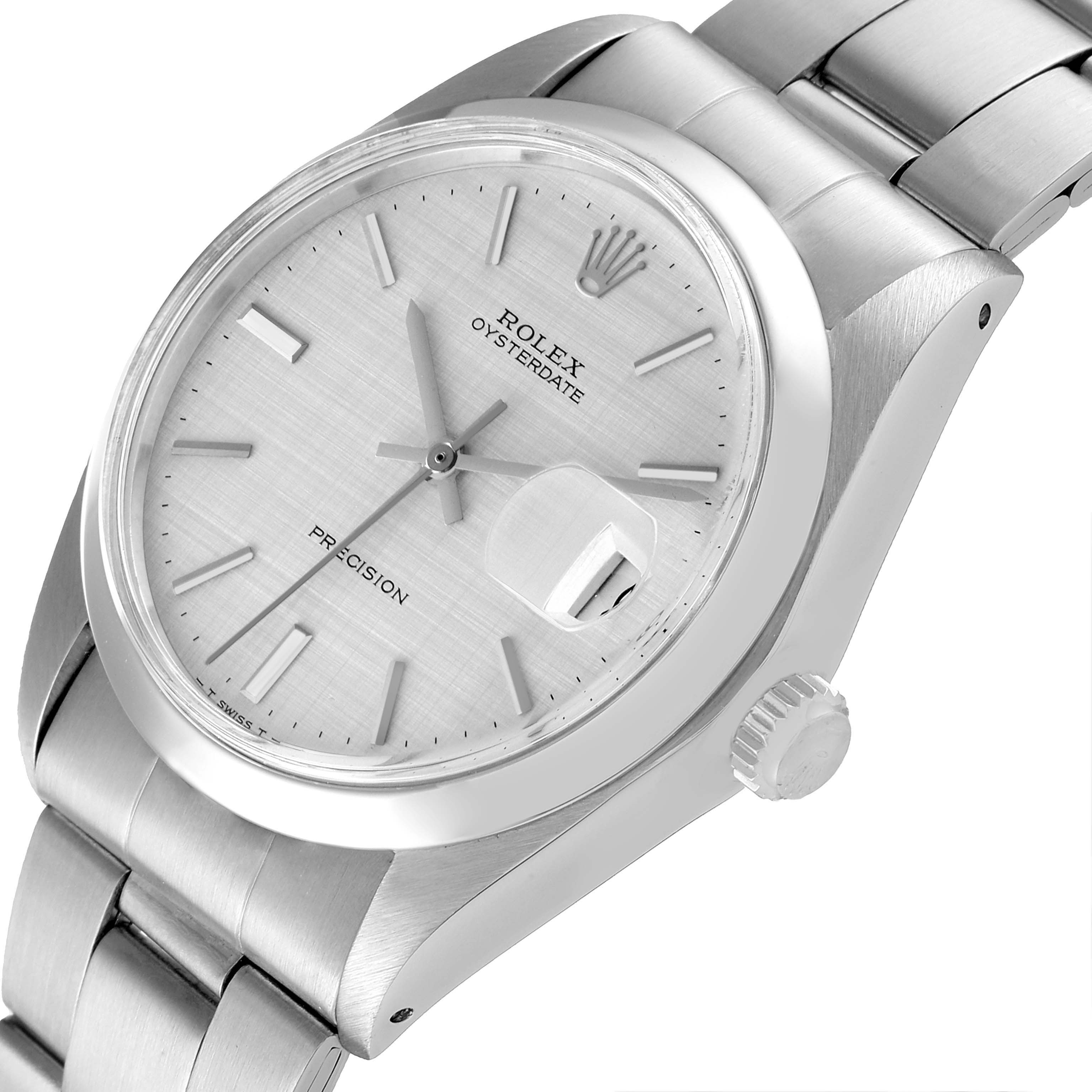 The image shows a close-up angled view of a Rolex Date 6694 Men's Stainless Steel Silver Dial 6694 Men's Stainless Steel Silver Dial model watch, highlighting the dial, crown, and part of the bracelet.