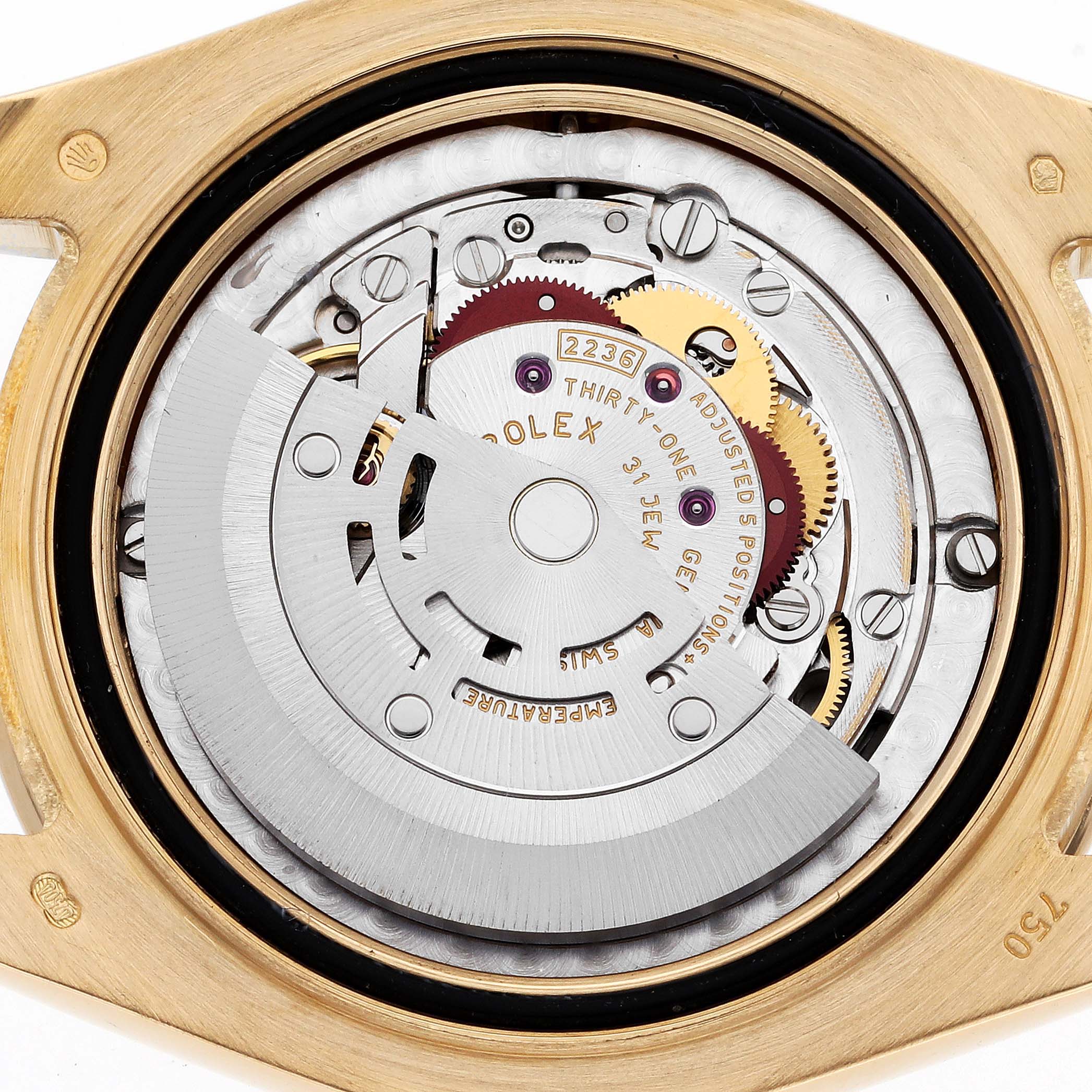 This image shows the internal mechanism of a Rolex Pearlmaster 81348SARO Women's Yellow Gold Champagne Dial 81348SARO Women's Yellow Gold Champagne Dial watch from a back angle.