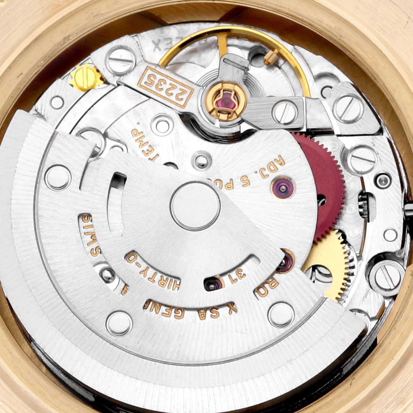 This image shows the intricate movement parts of a Rolex Pearlmaster 80318 Women's Yellow Gold Mother of Pearl Dial 80318 Women's Yellow Gold Mother of Pearl Dial watch from a close-up, internal angle.