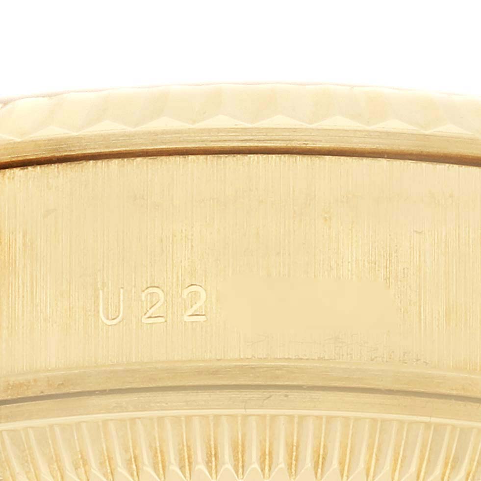 The image shows an angled close-up of the fluted bezel and case edge of a Rolex President 79178 Women
s Yellow Gold Champagne Dial 79178 Women
s Yellow Gold Champagne Dial watch.