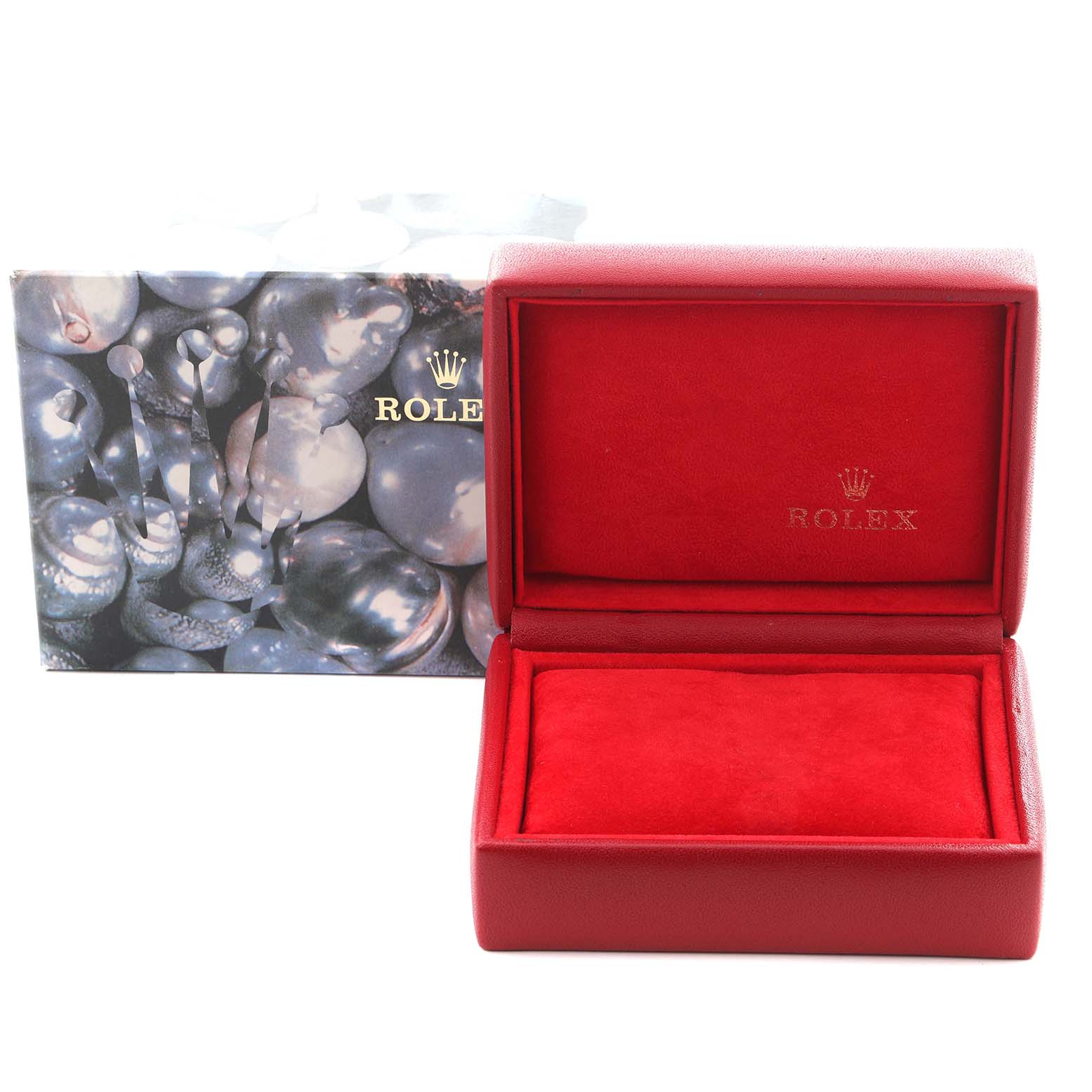 The image shows a red Rolex watch box for the President model, with the outer box featuring a pearl-like design.