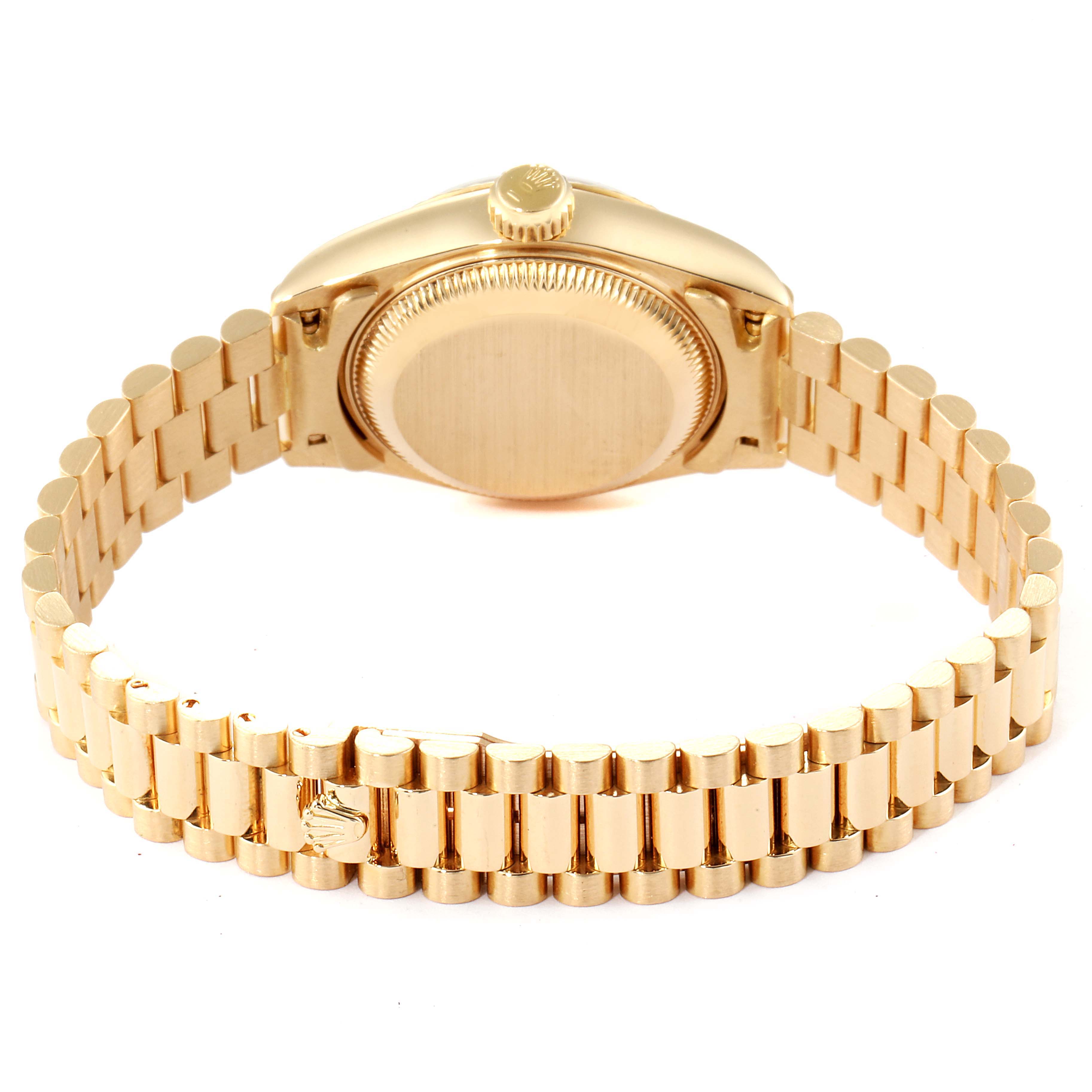 The image shows the backside and the bracelet of the Rolex President 69178 Women
s Yellow Gold Champagne Dial 69178 Women
s Yellow Gold Champagne Dial model watch, including the case back and crown.
