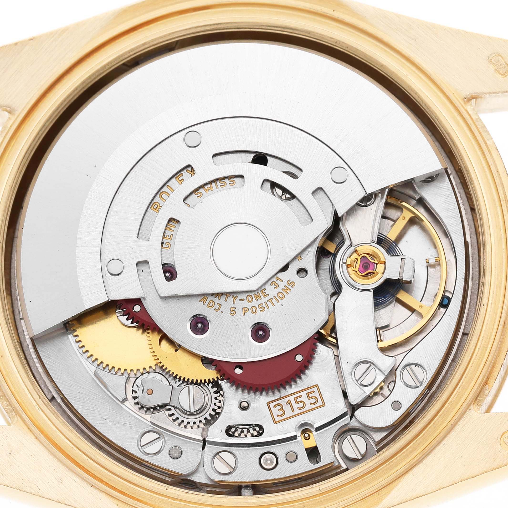 The image shows the intricate back view of the Rolex President 118388 Men's Yellow Gold Silver Dial model's movement and internal components.