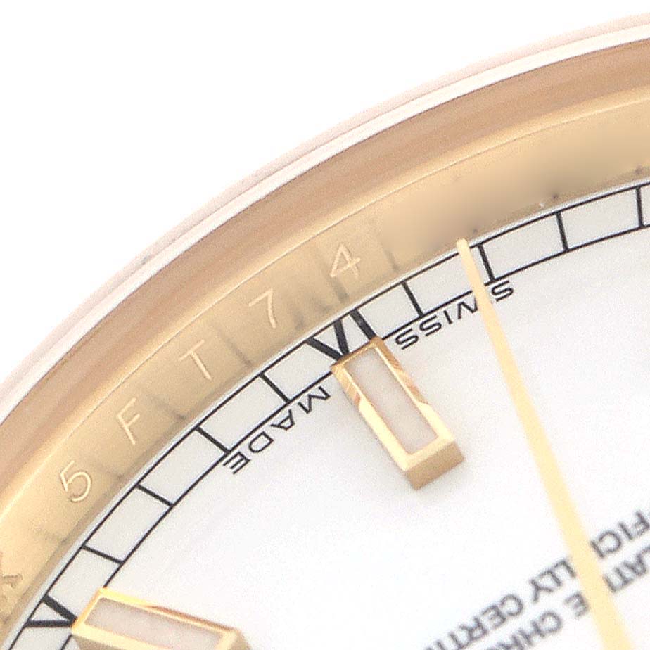 The image shows a close-up of the dial and bezel of a Rolex President 118238 Men
s Yellow Gold White Dial 118238 Men
s Yellow Gold White Dial watch, highlighting the hour markers and part of the outer bezel.