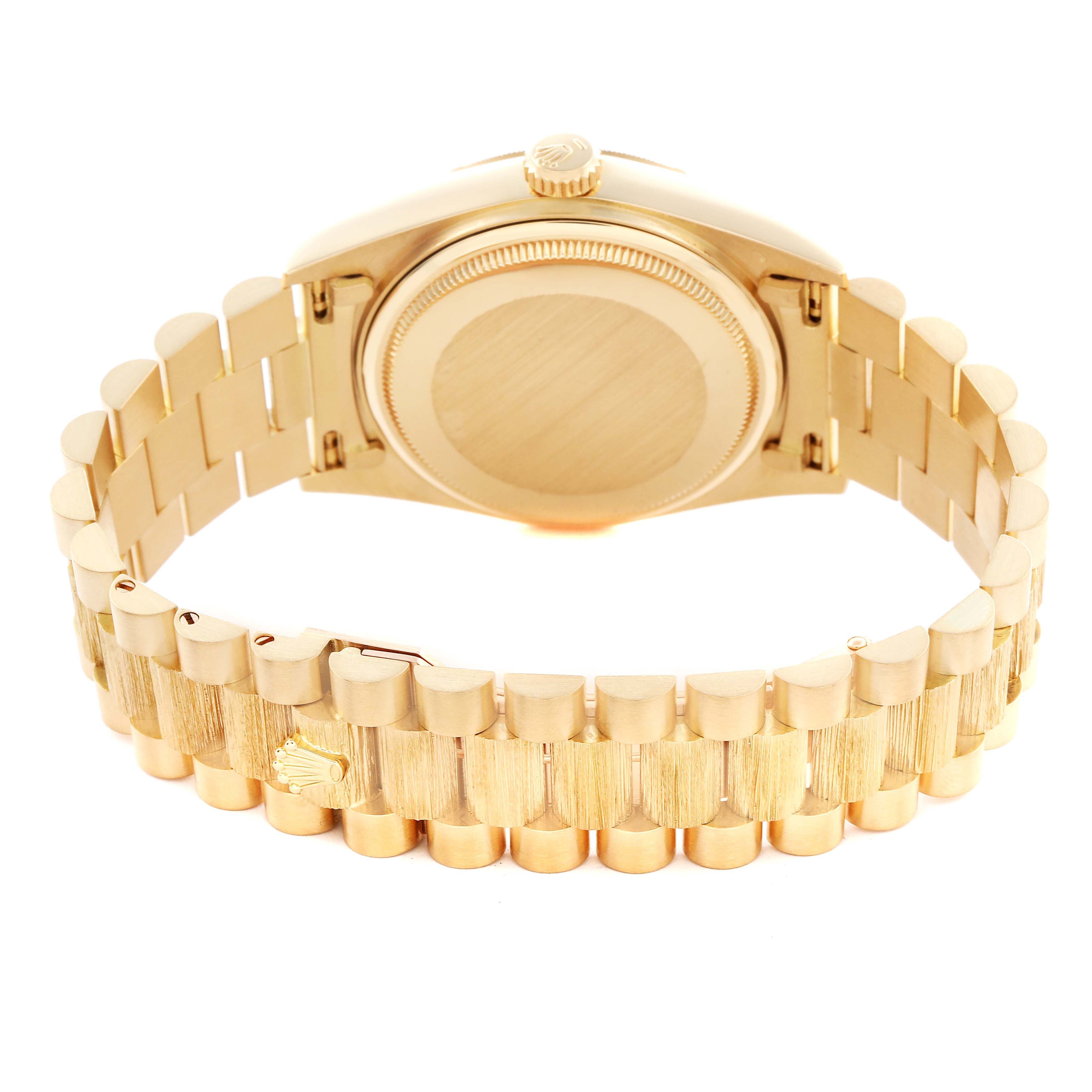 The image shows the back of a Rolex President 18078 Men
s Yellow Gold Champagne Dial 18078 Men
s Yellow Gold Champagne Dial watch and its gold bracelet, highlighting the case back and clasp.