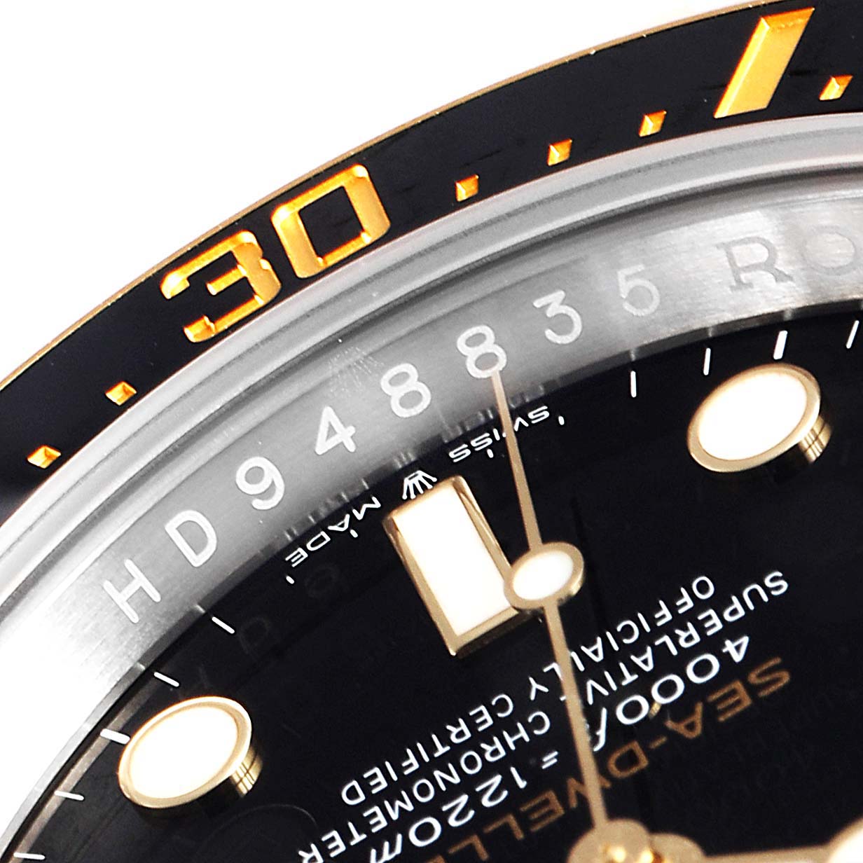 The image shows a close-up of the bezel and dial of the Rolex Sea-Dweller 126603 Men's Steel and Gold (two tone) Black Dial 126603 Men's Steel and Gold (two tone) Black Dial watch, focusing on the 30-minute mark.
