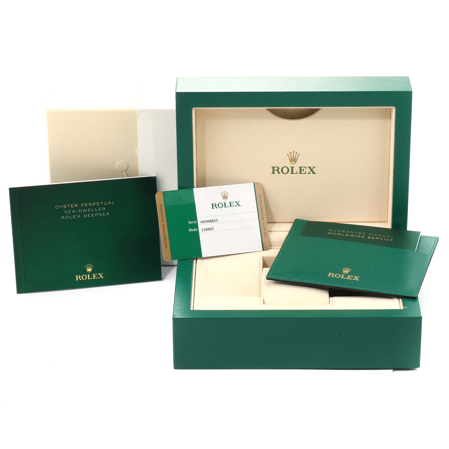 The image shows the accessories for a Rolex Sea-Dweller 126603 Men's Steel and Gold (two tone) Black Dial 126603 Men's Steel and Gold (two tone) Black Dial, including the watch box, manuals, and a warranty card.