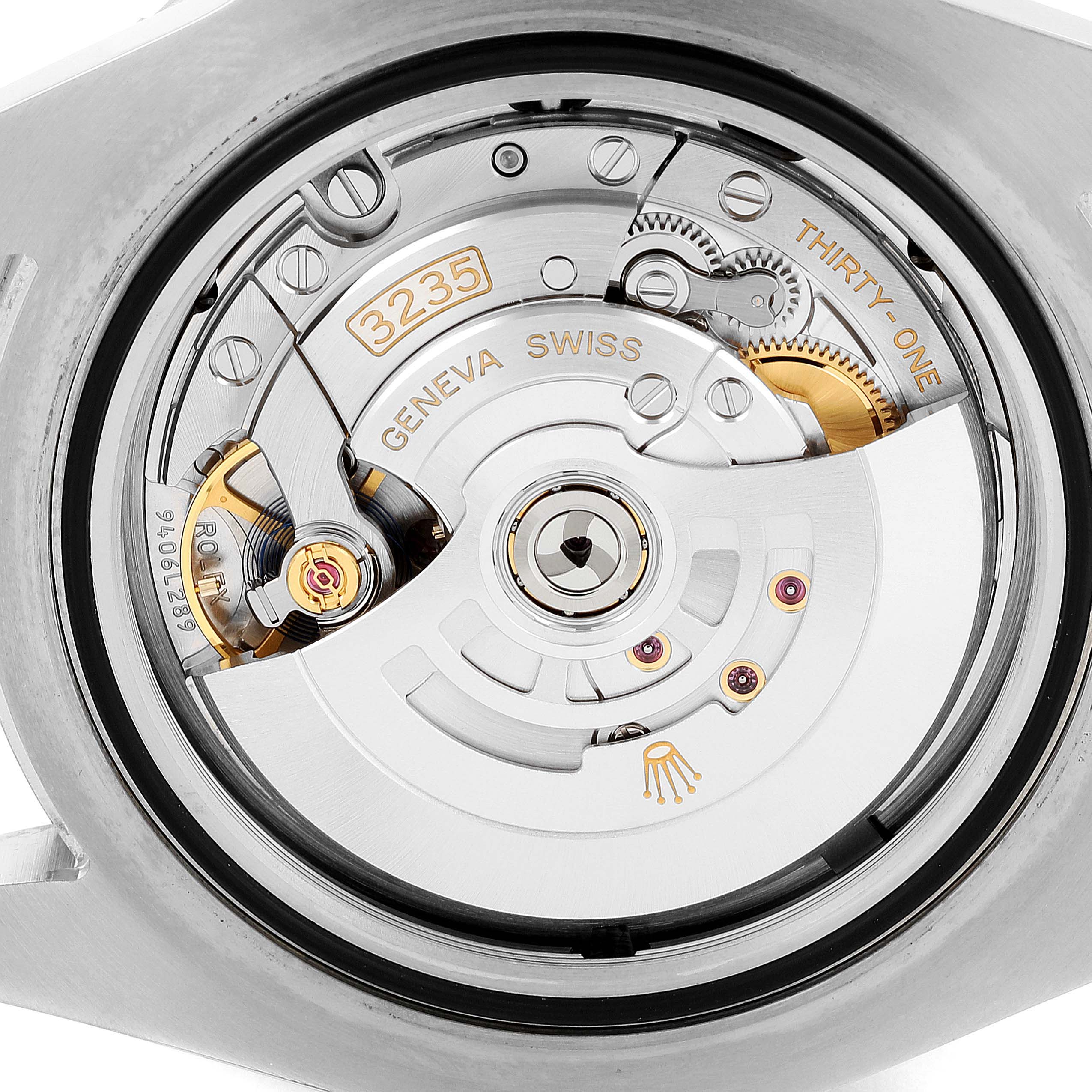 This image shows the inner movement of a Rolex Sea-Dweller 126603 Men's Steel and Gold (two tone) Black Dial 126603 Men's Steel and Gold (two tone) Black Dial watch, highlighting parts like the rotor and gears.