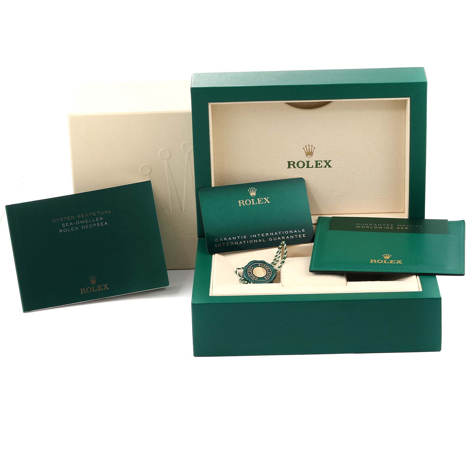 The image shows the packaging and accessories for a Rolex Sea-Dweller 126603 Men's Steel and Gold (two tone) Black Dial 126603 Men's Steel and Gold (two tone) Black Dial, including booklets, tags, and the watch box.