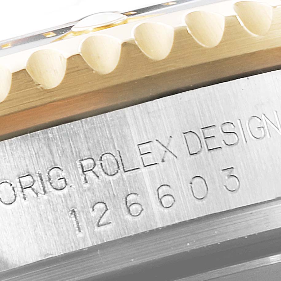 This close-up angle displays the engraved bezel and model number of the Rolex Sea-Dweller 126603 Men's Steel and Gold (two tone) Black Dial 126603 Men's Steel and Gold (two tone) Black Dial watch.