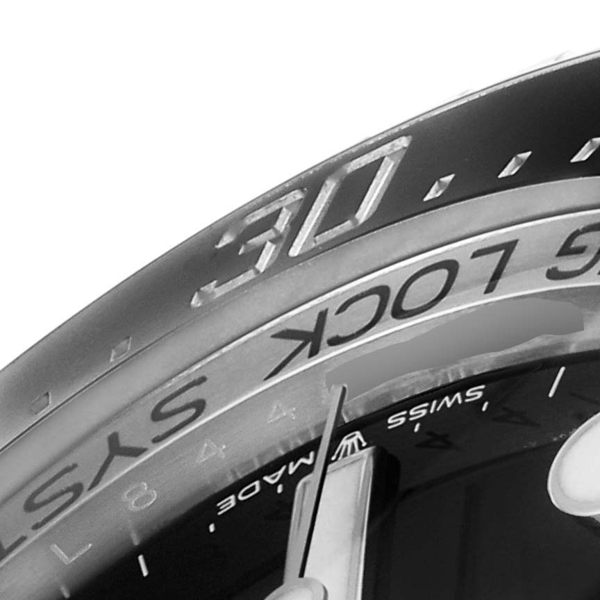 The image shows a close-up of the bezel and part of the dial of a Rolex Sea-Dweller 126660 Men
s Stainless Steel Blue Dial 126660 Men
s Stainless Steel Blue Dial watch, highlighting the "30" marker and "RING LOCK SYSTEM."
