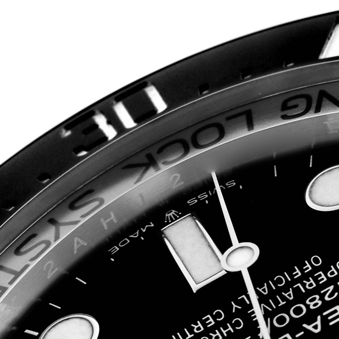 The image shows a close-up of the Rolex Sea-Dweller 136660 Men
s Stainless Steel Black Dial 136660 Men
s Stainless Steel Black Dial
s dial and bezel, highlighting the markings and part of the minute hand.