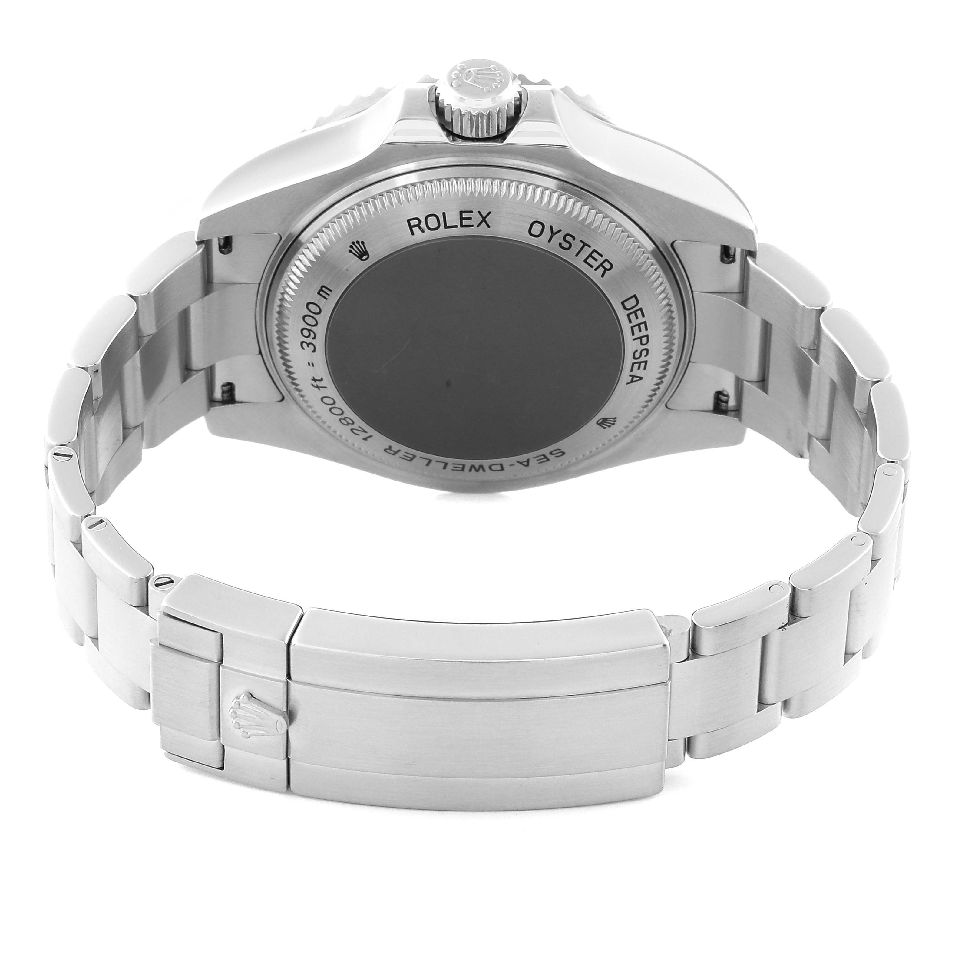 This image shows the back side of the Rolex Sea-Dweller 116660 Men
s Stainless Steel Black Dial 116660 Men
s Stainless Steel Black Dial watch and part of its metal bracelet.