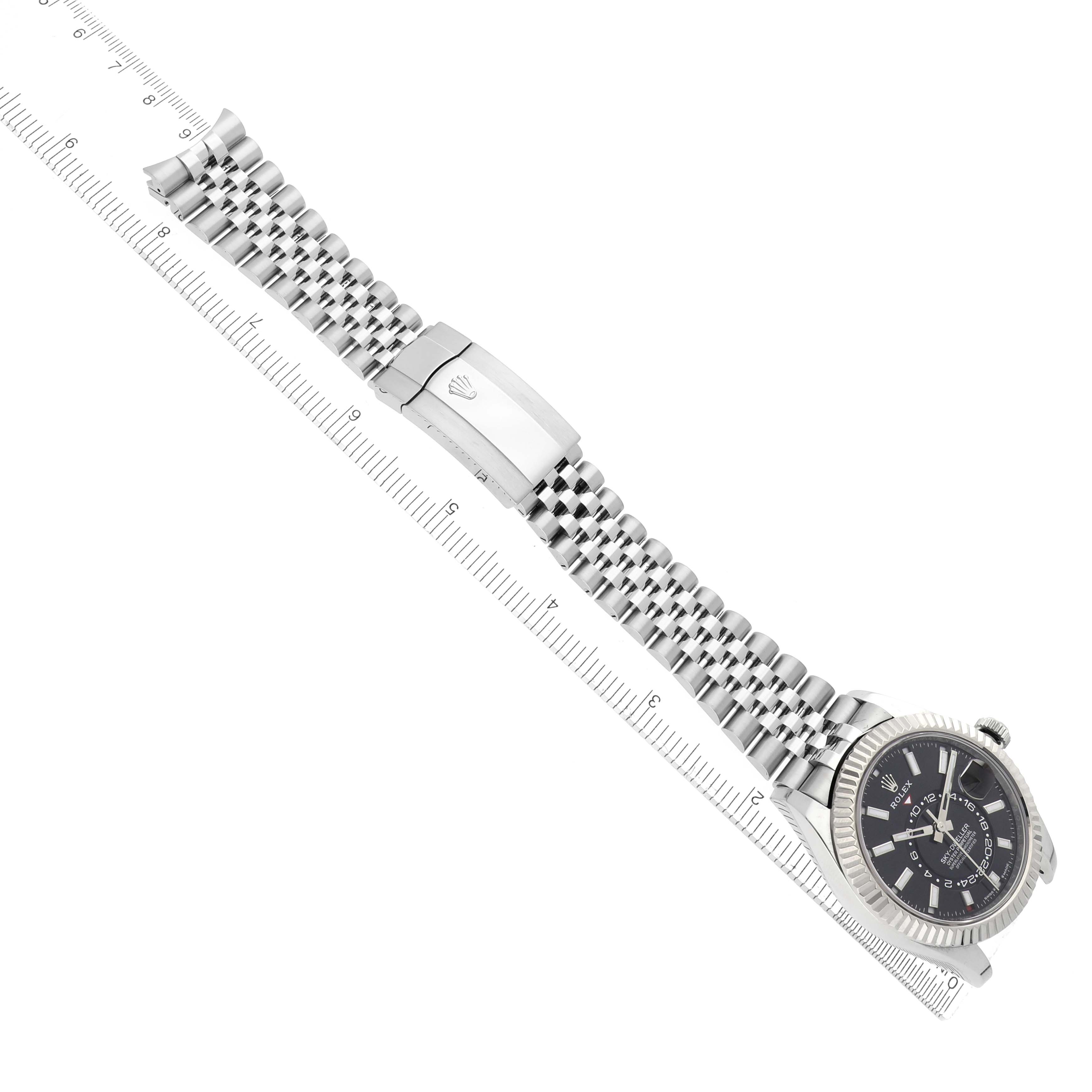 The image shows a Rolex Sky-Dweller 336934 Men's Stainless Steel Black Dial watch at a slight diagonal angle, displaying the bracelet, clasp, and face.