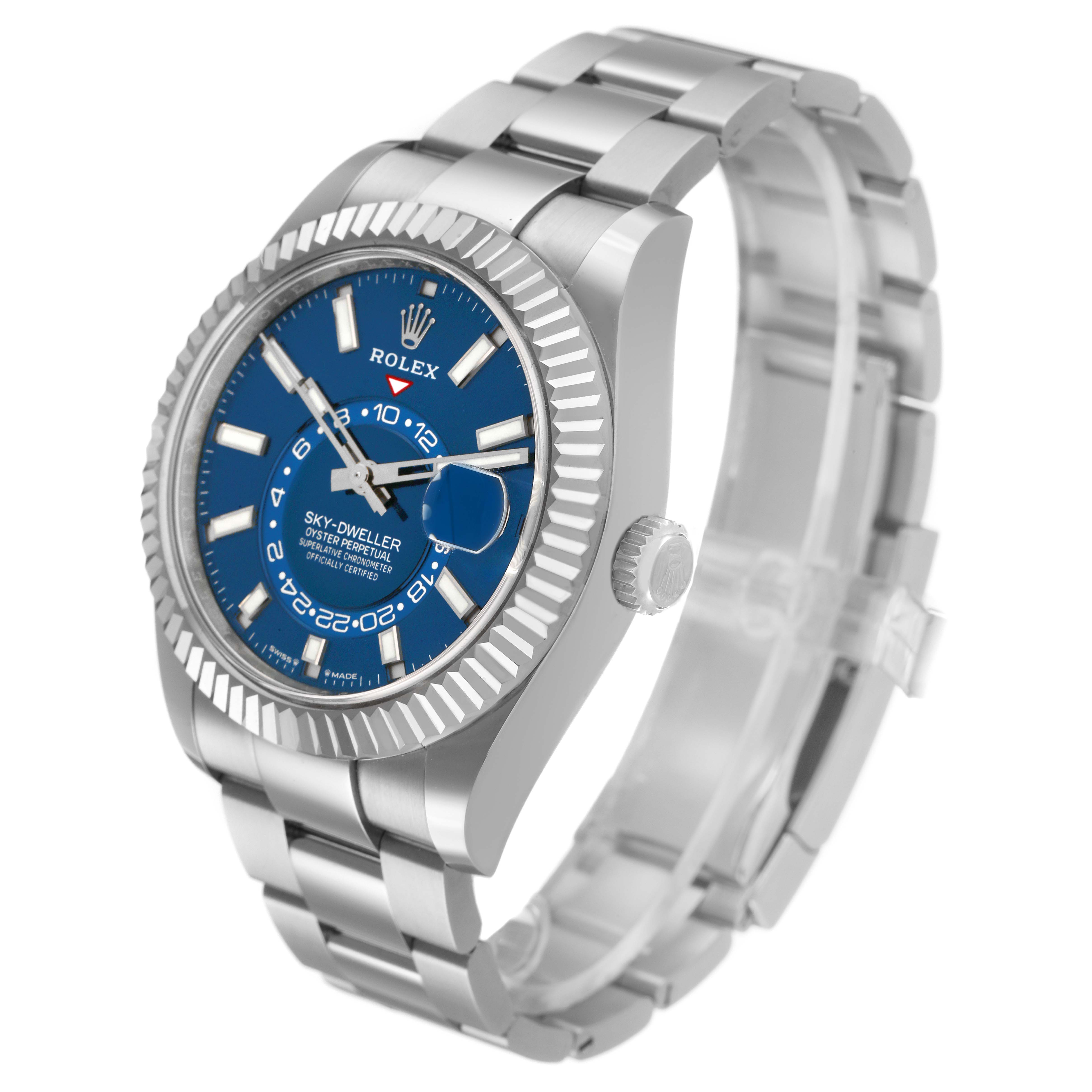 The Rolex Sky-Dweller 336934 Men's Stainless Steel Blue Dial watch is shown at an angle highlighting the blue dial, fluted bezel, and Oyster bracelet.
