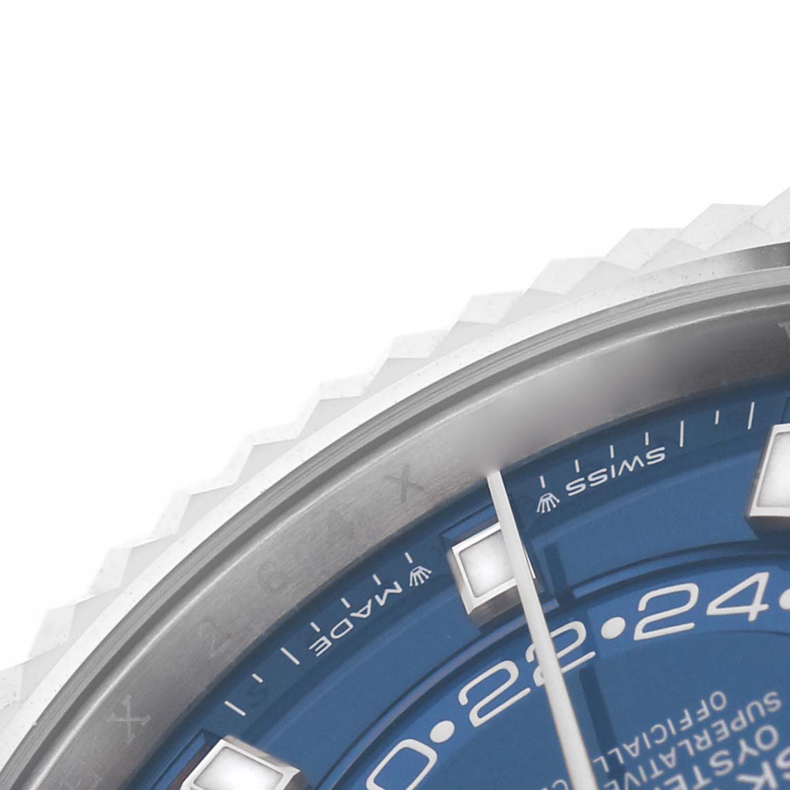 The image shows a close-up of the Rolex Sky-Dweller 336934 Men's Stainless Steel Blue Dial watch's dial and bezel at an angle, focusing on the blue face and hour markers.