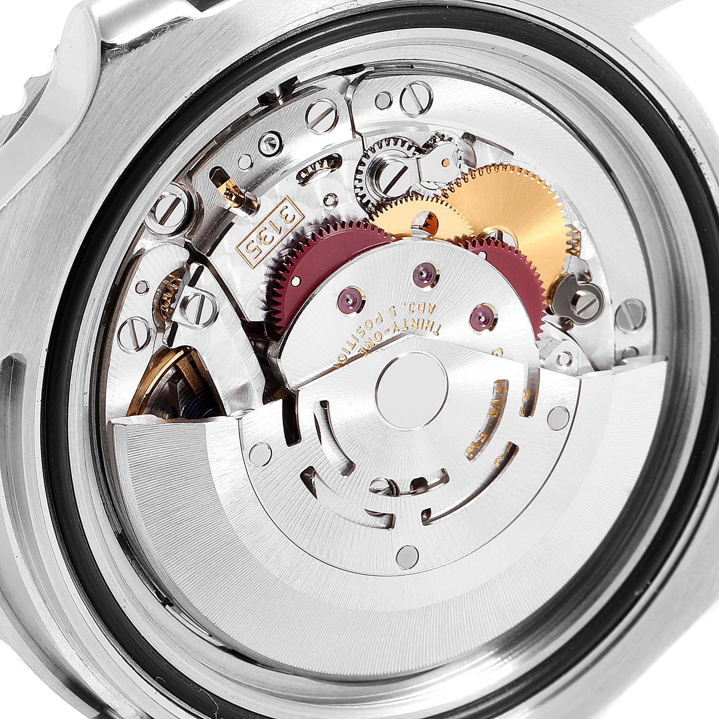 This close-up image shows the intricate automatic movement mechanism of a Rolex Submariner 116610 Men
s Stainless Steel Black Dial 116610 Men
s Stainless Steel Black Dial watch.