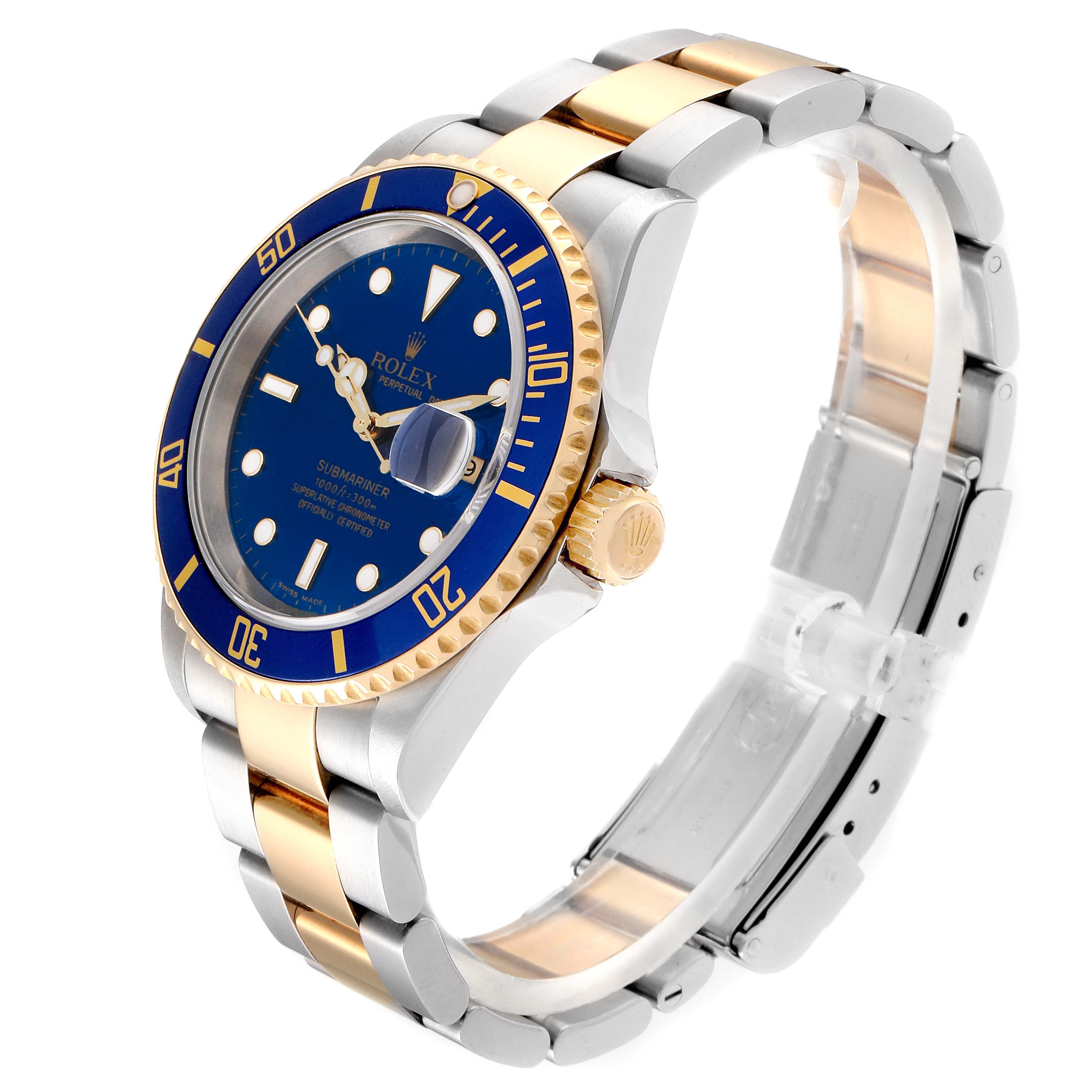The image shows a Rolex Submariner 16613 Men
s Steel and Gold (two tone) Blue Dial 16613 Men
s Steel and Gold (two tone) Blue Dial watch at a three-quarter angle, highlighting the bezel, dial, crown, and bracelet.