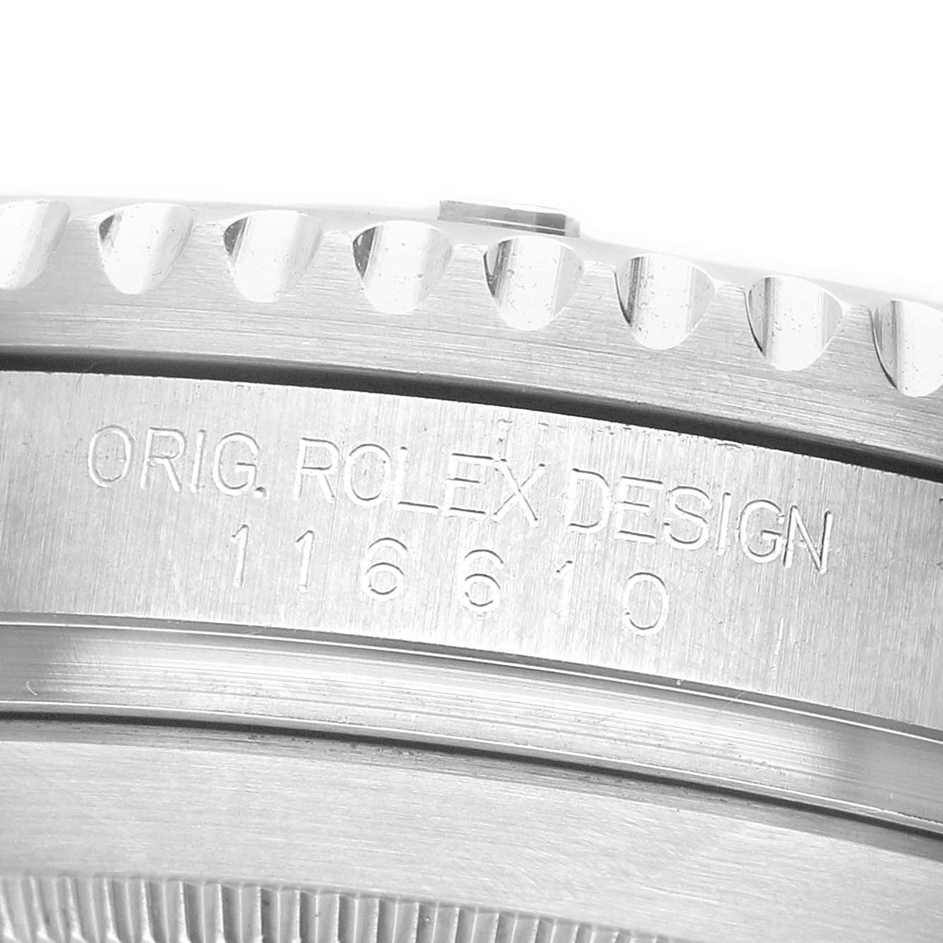 The image shows a close-up of the engraved side of the Rolex Submariner 116610 Men's Stainless Steel Black Dial watch case, specifically the model number and design detailing.