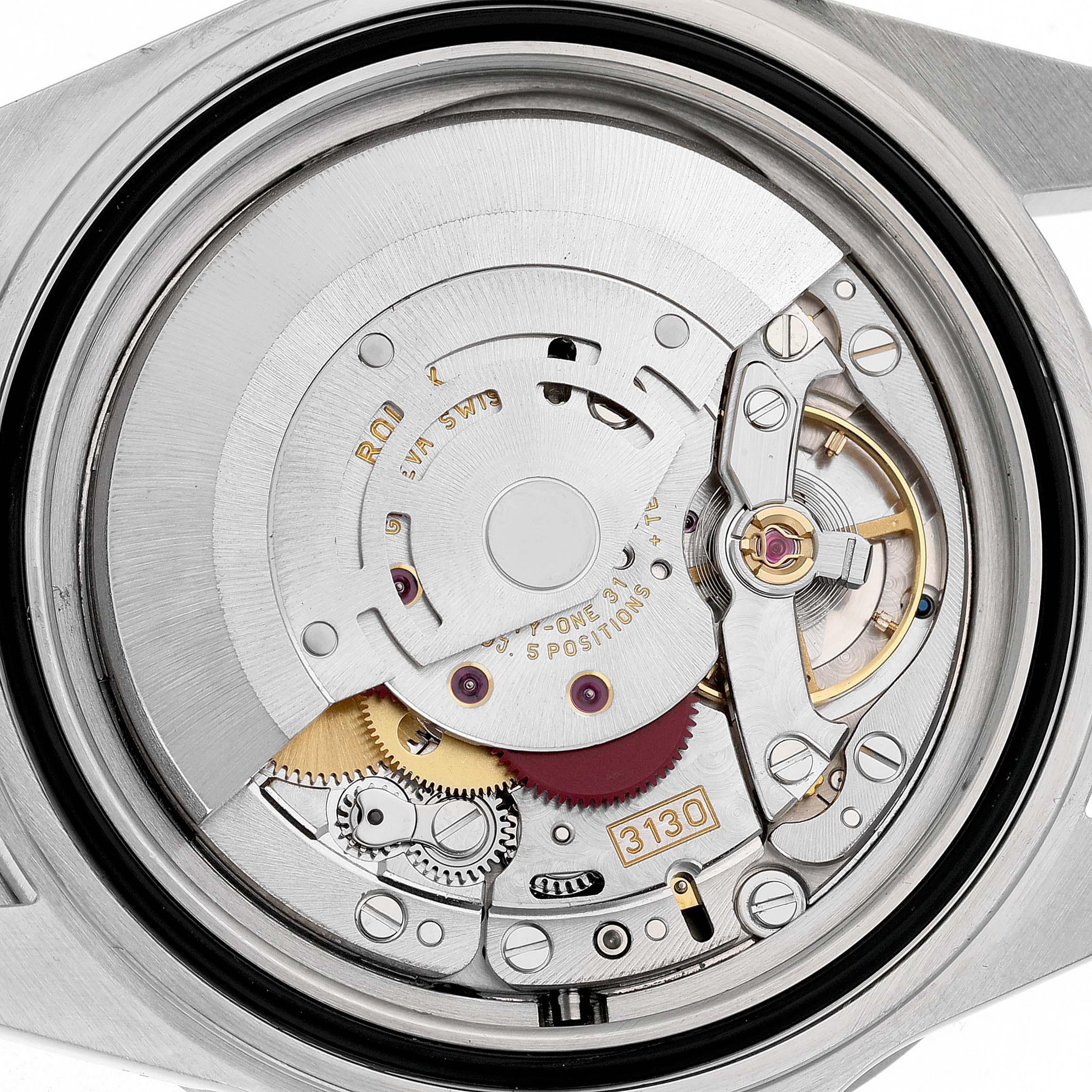 The image shows the movement of a Rolex Submariner 14060 Men's Stainless Steel Black Dial from a top-down angle, highlighting gears and components.