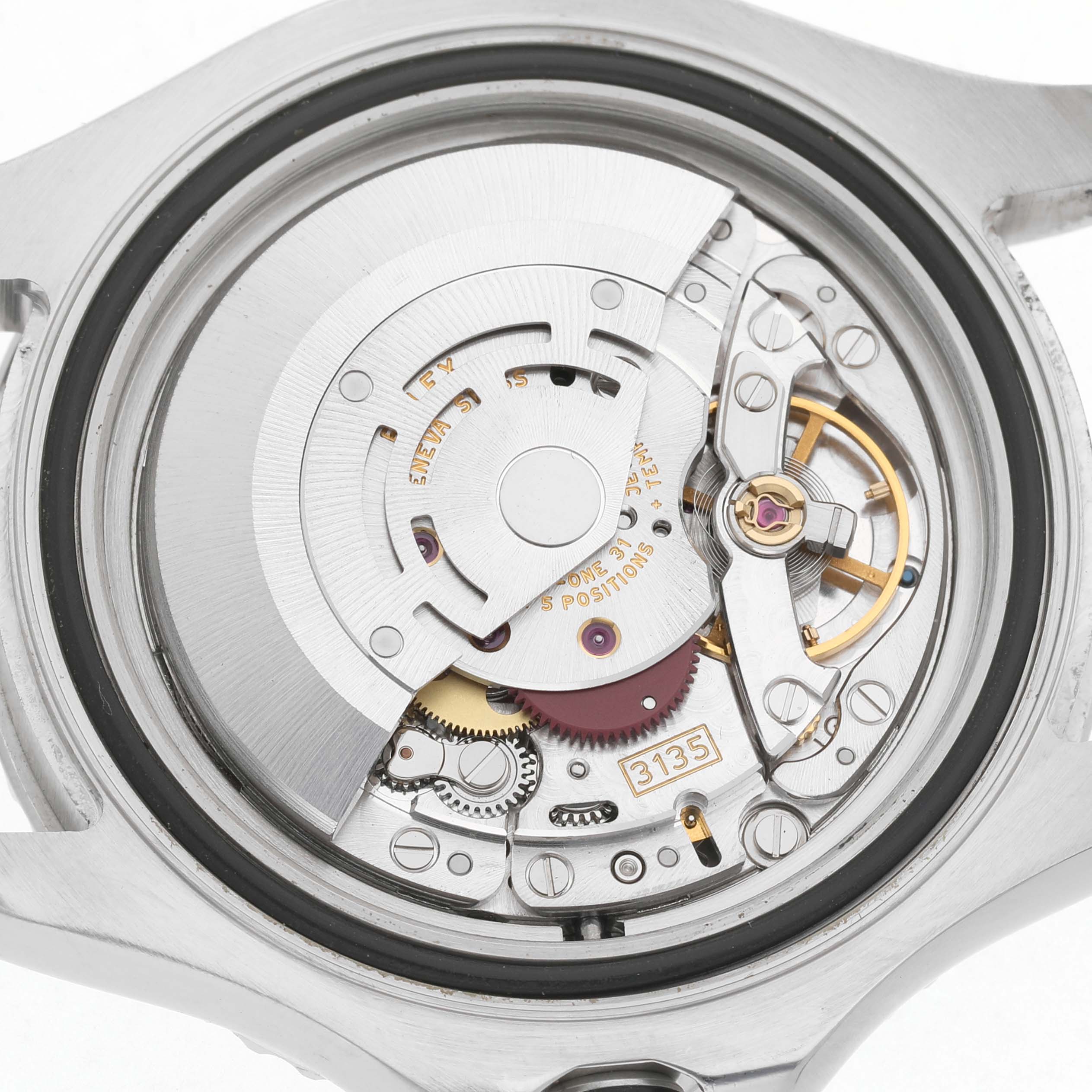 The image shows the movement of a Rolex Yacht-Master 16622 Men's Stainless Steel Silver Dial watch with a focus on its intricate components.