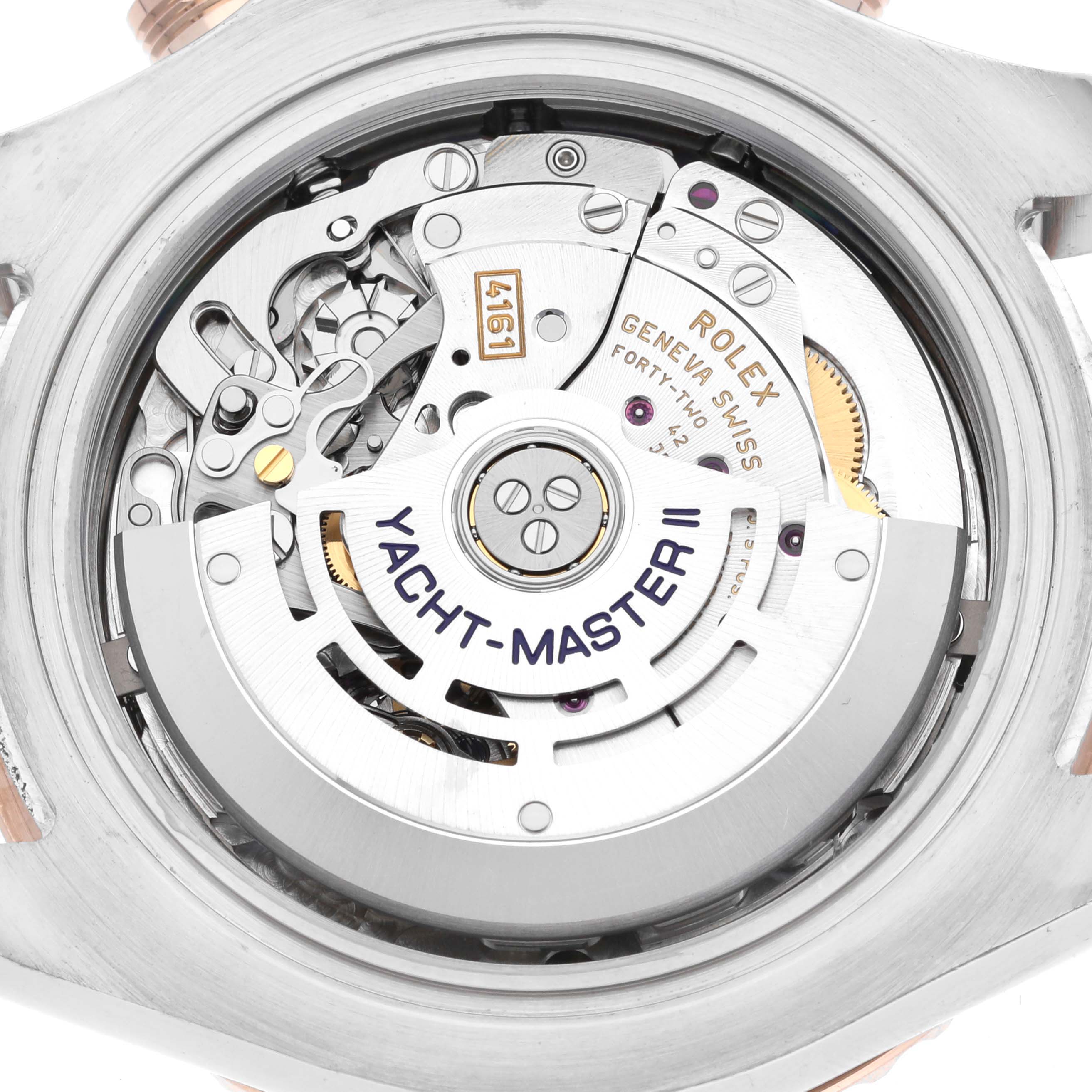 The image shows the movement and internal mechanism of a Rolex Yacht-Master 116681 Men's Steel and Gold (two tone) White Dial 116681 Men's Steel and Gold (two tone) White Dial II watch from the back angle.