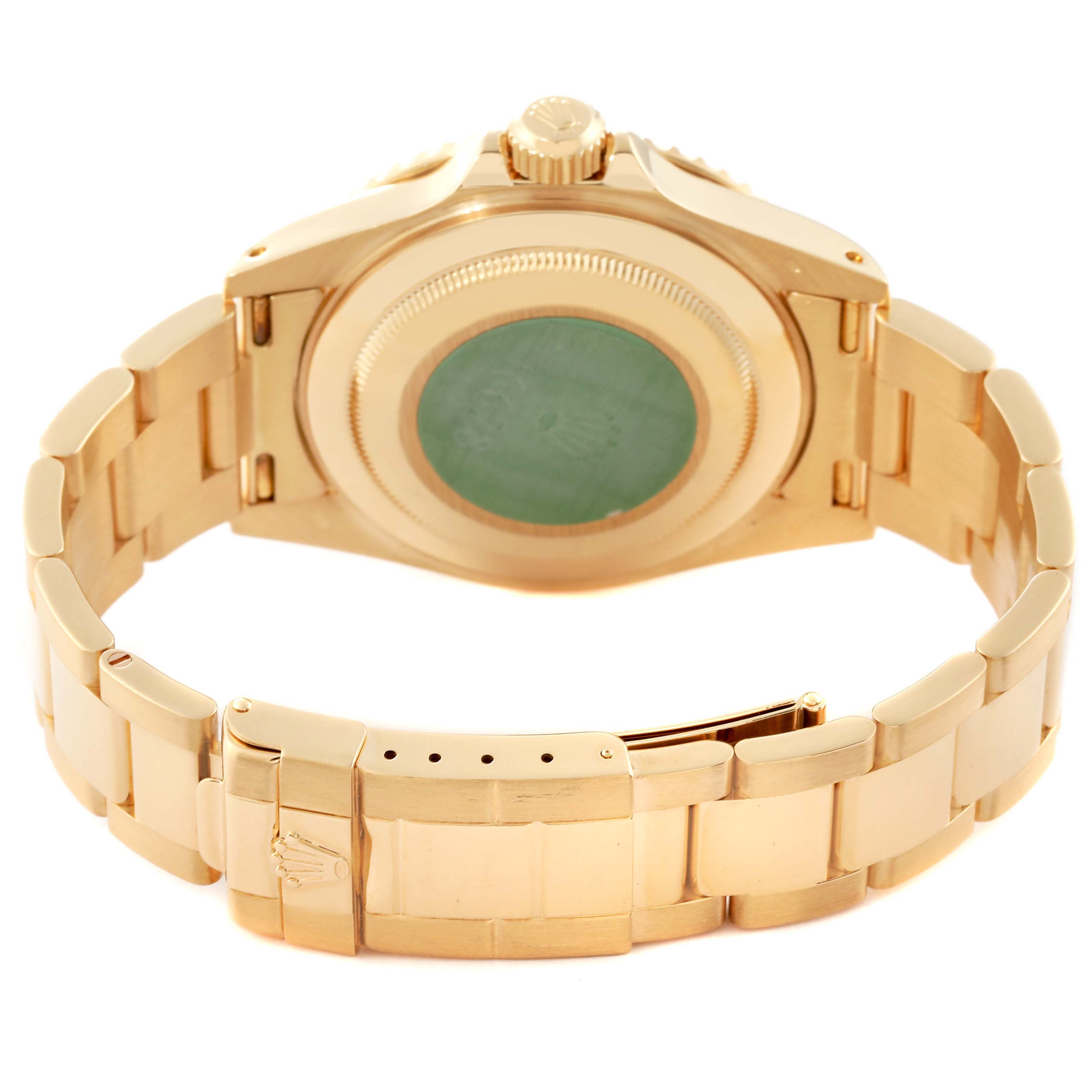 This image shows the Rolex Yacht-Master 16628 Men's Yellow Gold Mother of Pearl Dial 16628 Men's Yellow Gold Mother of Pearl Dial watch from the back, displaying the case back, crown, and bracelet.