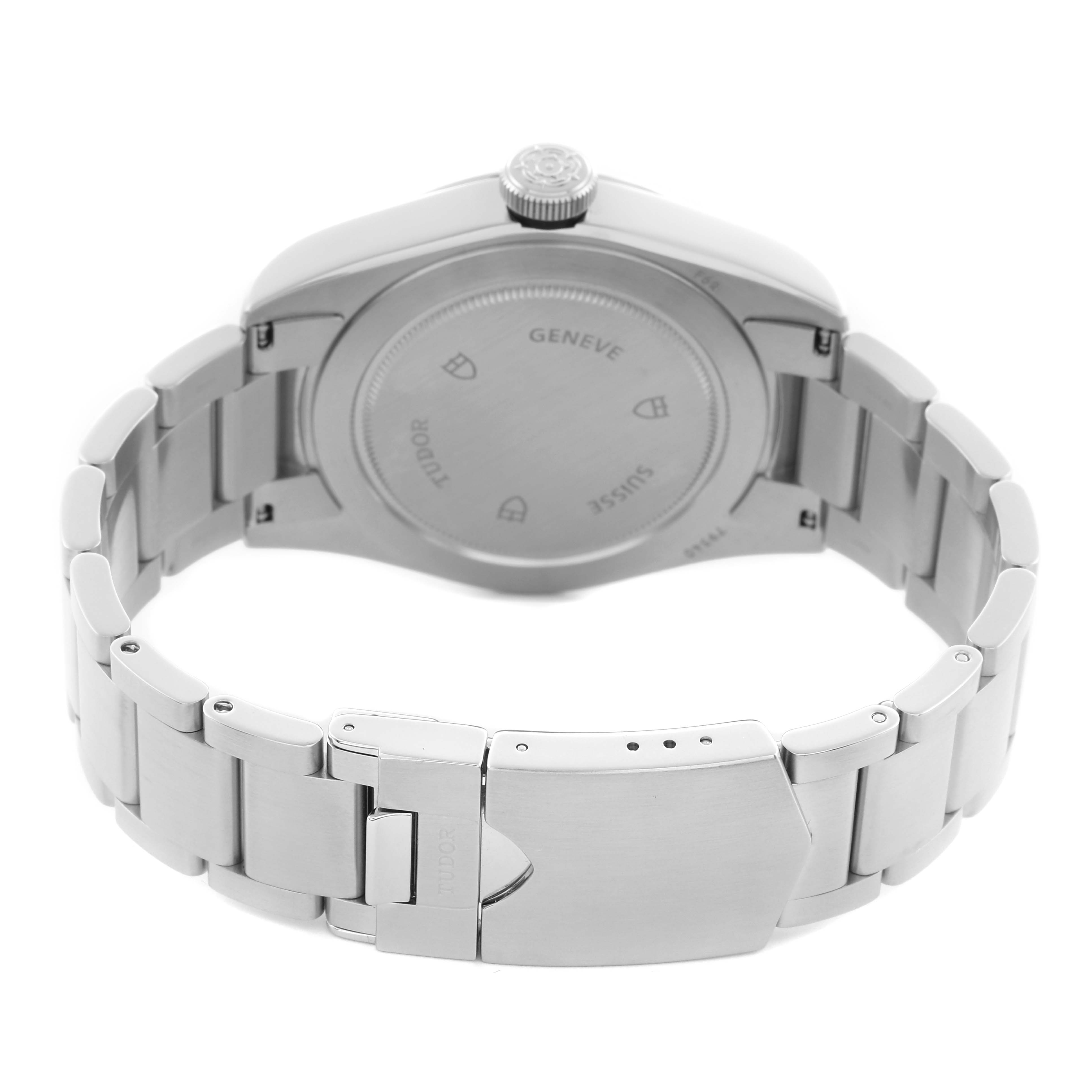 The Tudor Heritage Black Bay 79540 Men
s Stainless Steel Blue Dial 79540 Men
s Stainless Steel Blue Dial watch is shown from the back, highlighting its case back, crown, and metal bracelet with clasp.