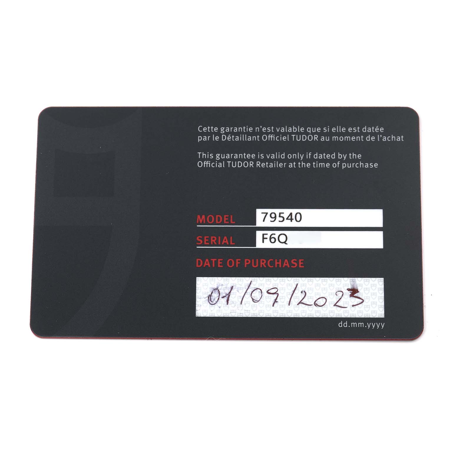 The image shows a warranty card for the Tudor Heritage Black Bay 79540 Men
s Stainless Steel Blue Dial 79540 Men
s Stainless Steel Blue Dial model, showing model and serial numbers, and date of purchase.