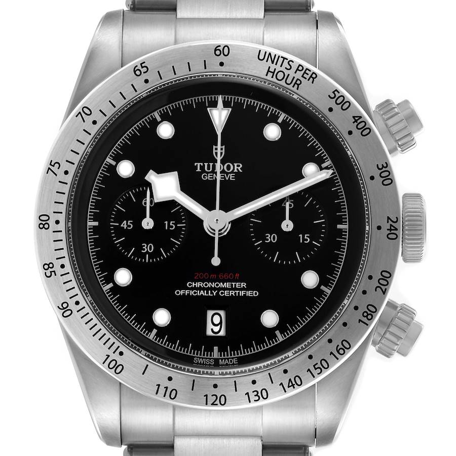 The Tudor Heritage Black Bay watch is shown from a front angle, highlighting the dial, bezel, and crown.