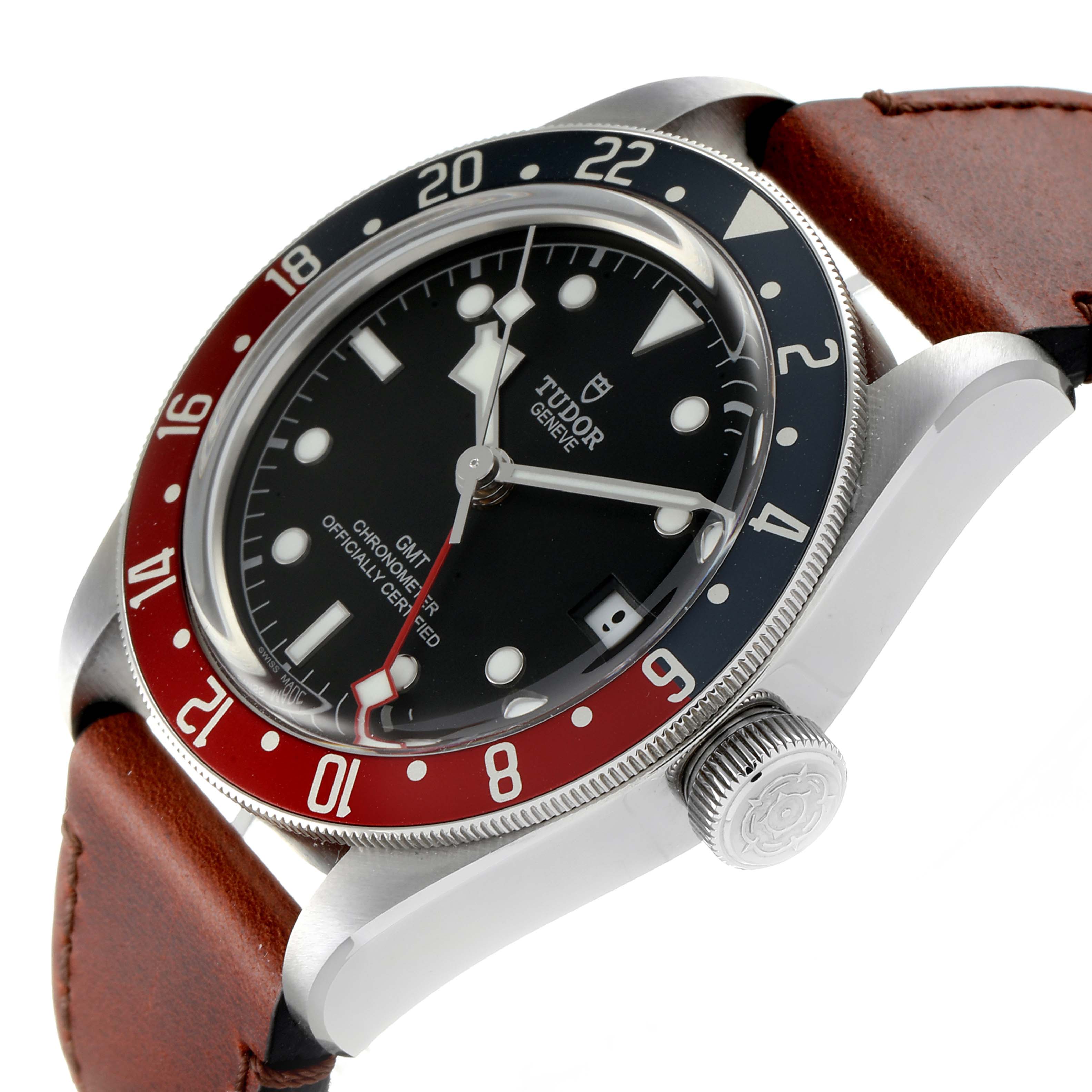 The Tudor Heritage Black Bay 79830RB Men
s Stainless Steel Black Dial 79830RB Men
s Stainless Steel Black Dial watch is shown from a side angle, highlighting the bezel, dial, crown, case, and leather strap.