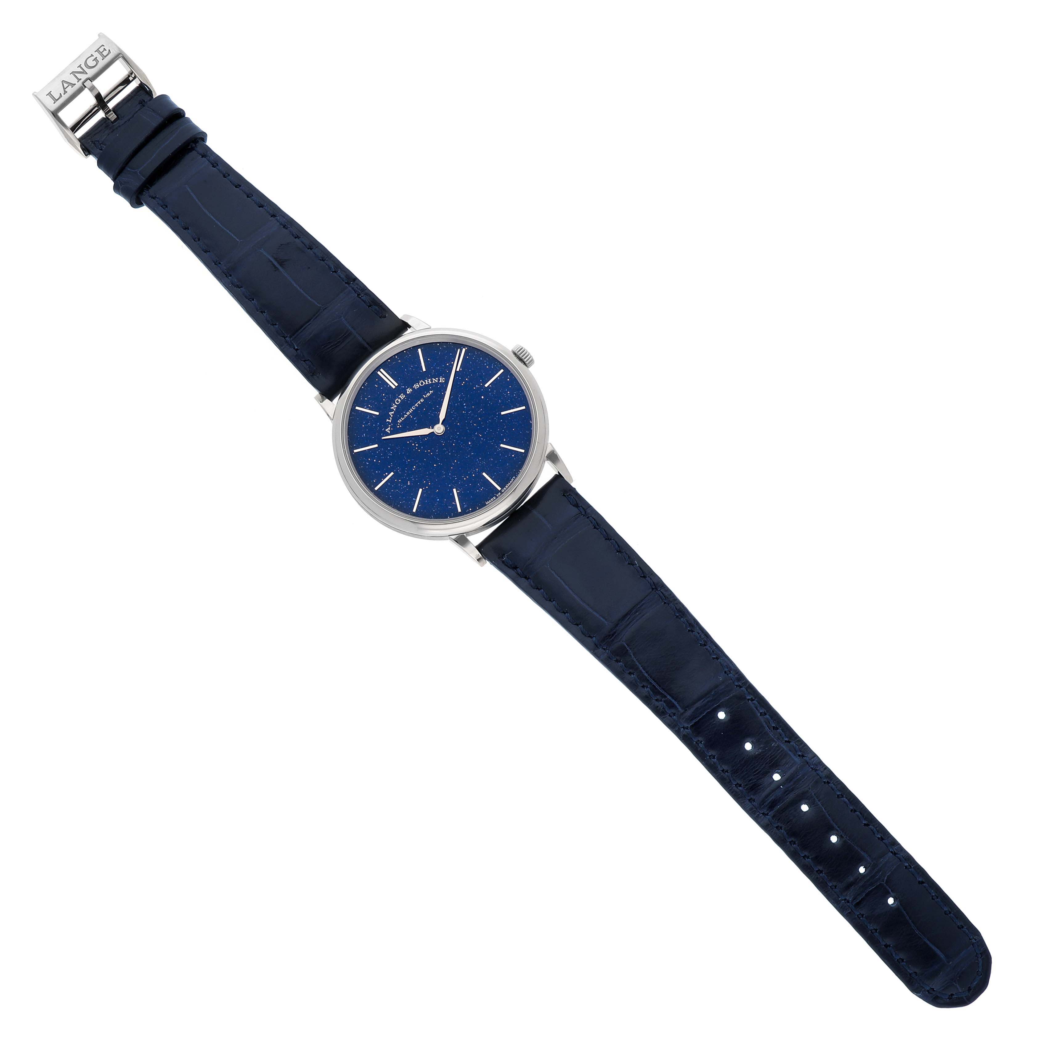 The Saxonia by A. Lange & Söhne is shown from a top-down angle, displaying the face and entire strap.