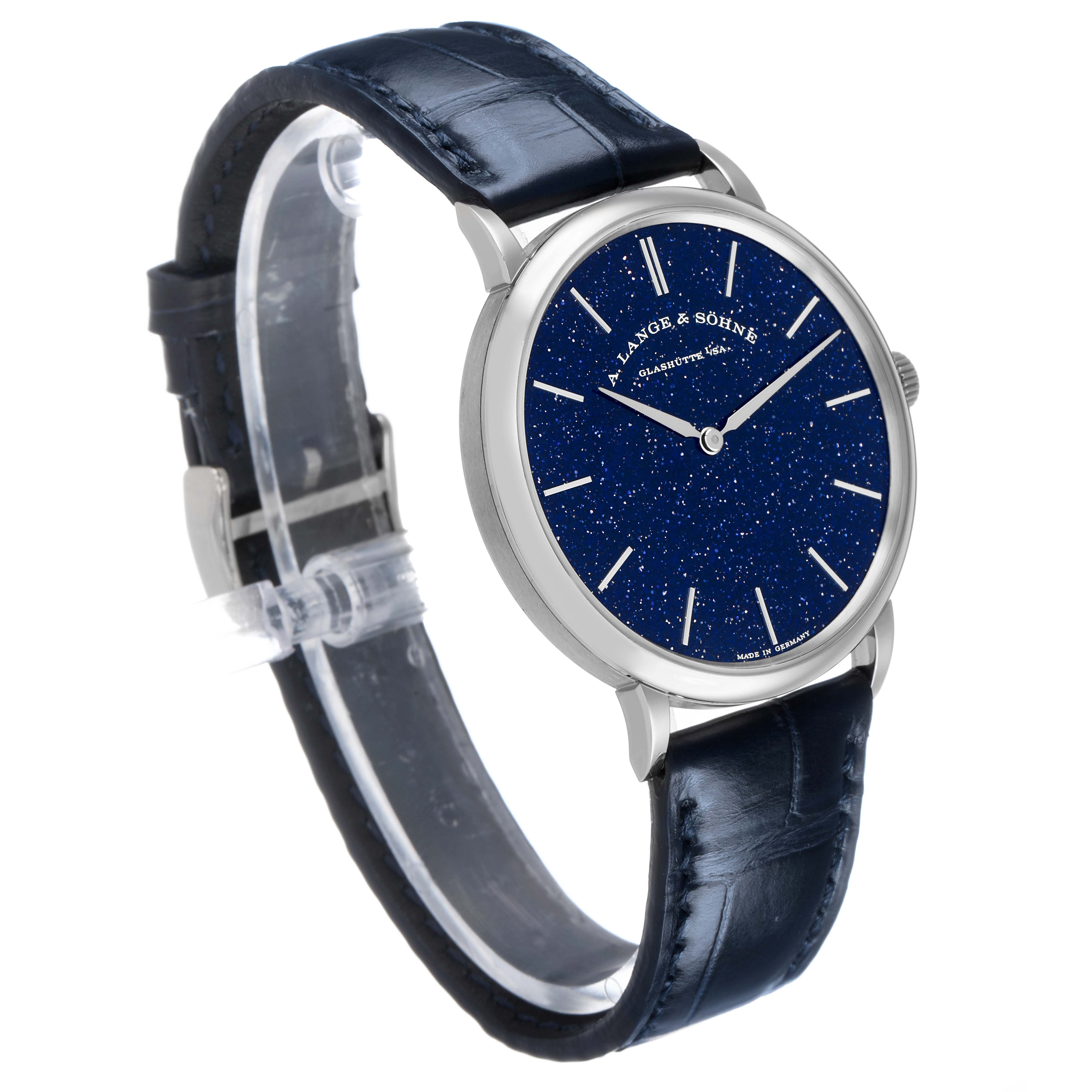 The A. Lange & Sohne Saxonia 205.086 Men's White Gold Blue Dial watch is shown at an angled side view, highlighting the blue starry dial and leather strap.