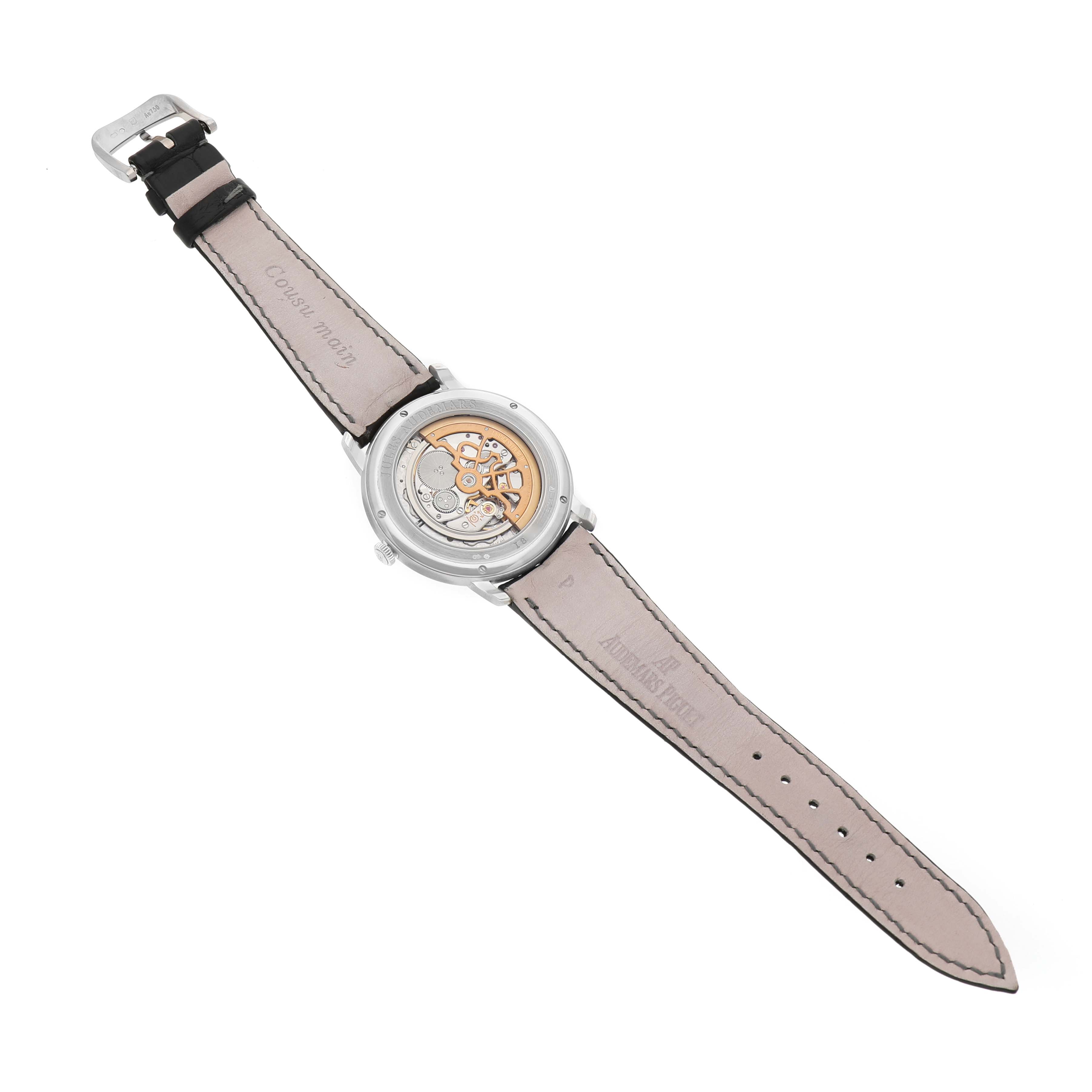The image shows the back view of an Audemars Piguet Jules 15180BC Men's White Gold Silver Dial model, highlighting the movement and inner mechanics.