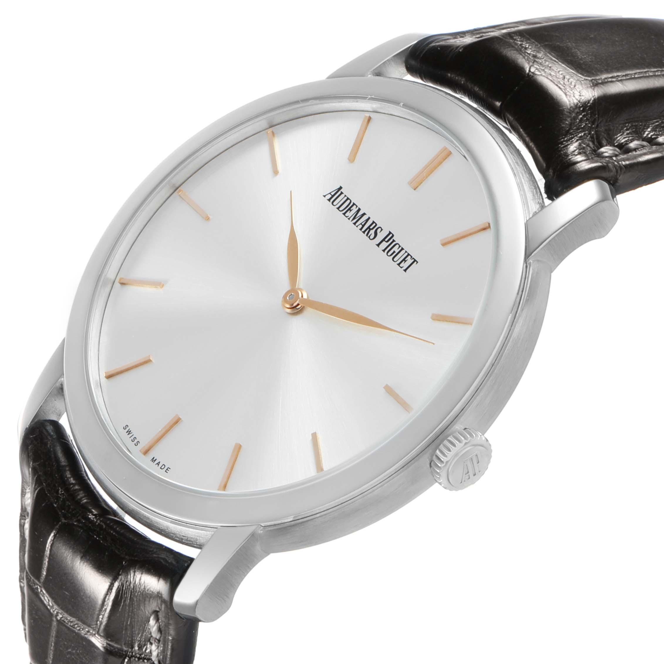 The image shows a Jules model watch by Audemars Piguet at a slight angled view, displaying its dial, hands, bezel, and crown, with a leather strap.