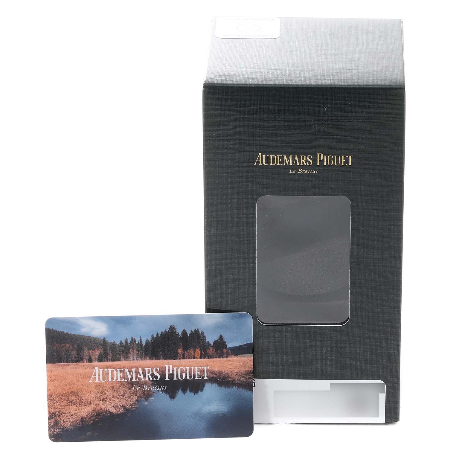 The image shows the packaging and warranty card for the Audemars Piguet Royal Oak Women's Steel and Gold (two tone) Grey Dial Women's Steel and Gold (two tone) Grey Dial model.