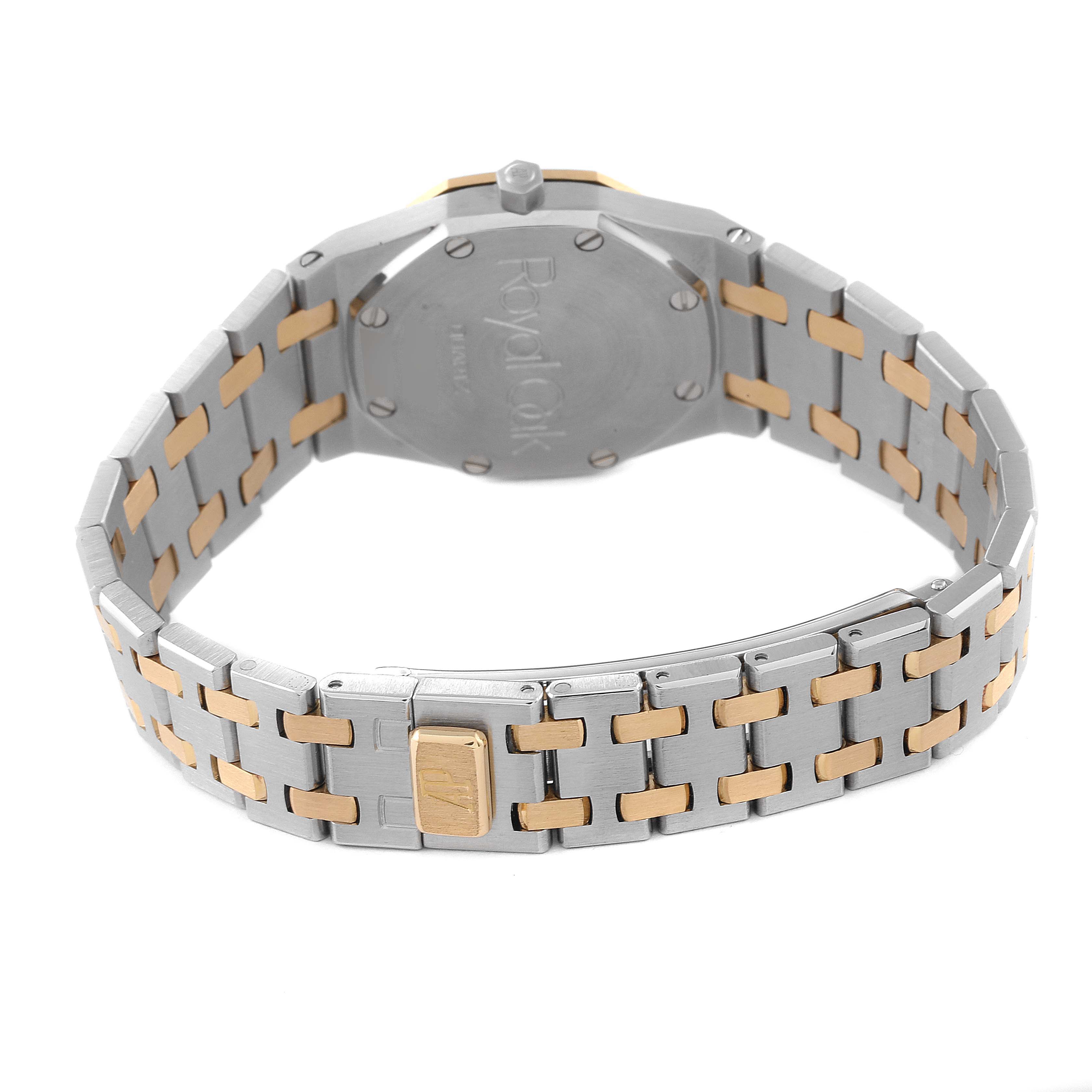 This image shows the back view and metal bracelet of an Audemars Piguet Royal Oak Women's Steel and Gold (two tone) Grey Dial Women's Steel and Gold (two tone) Grey Dial watch.