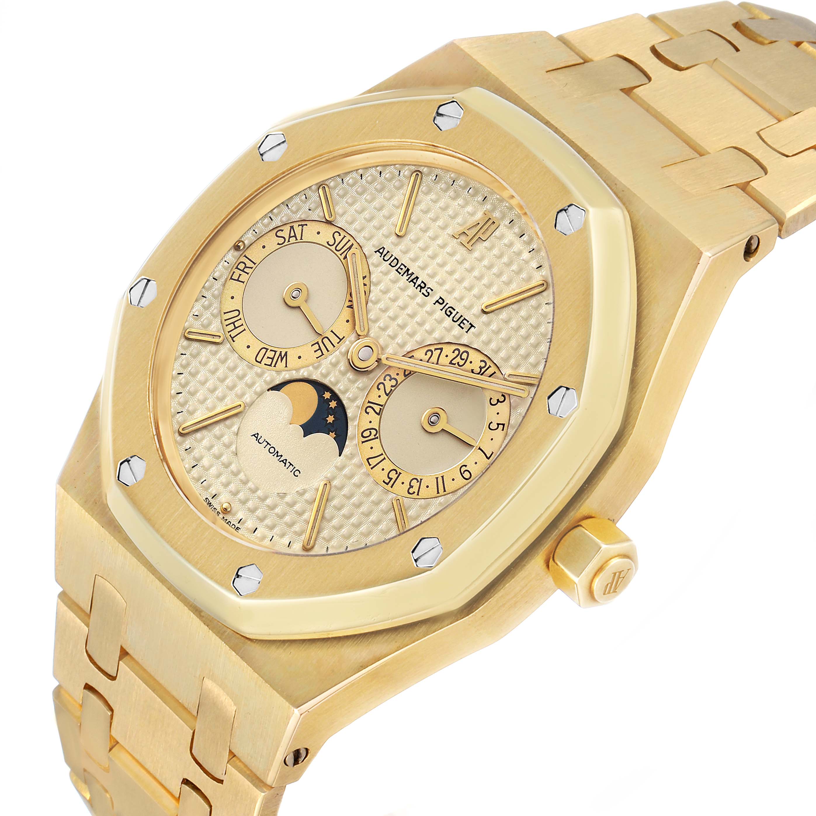 The image shows a Royal Oak by Audemars Piguet from a three-quarter angle, highlighting the gold case, dial, and bracelet.