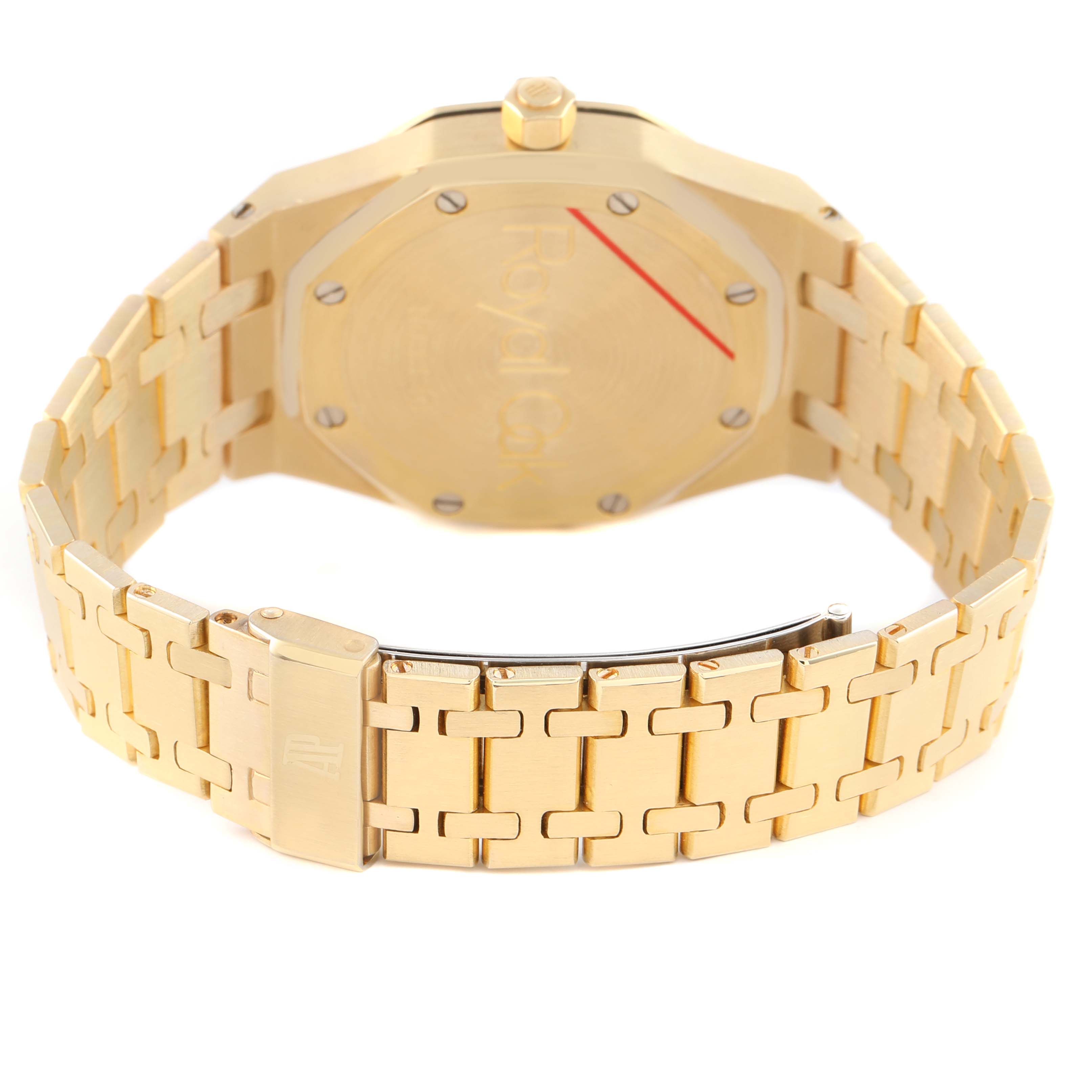 The image shows the back view of the Audemars Piguet Royal Oak 25594BA Men's Yellow Gold Champagne Dial, highlighting its gold bracelet and case back.